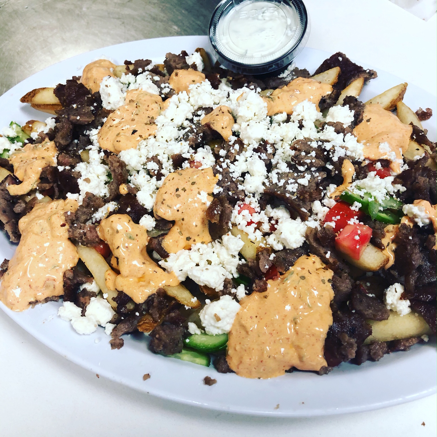 Order Loaded Fries food online from Your Greek Cousin store, West Palm Beach on bringmethat.com