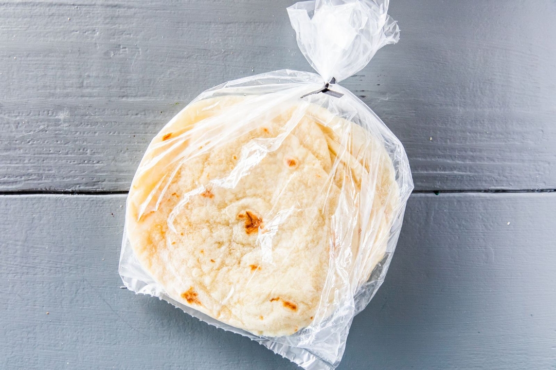 Order Fresh Flour Tortillas (dz) food online from The Taco Stand store, Houston on bringmethat.com