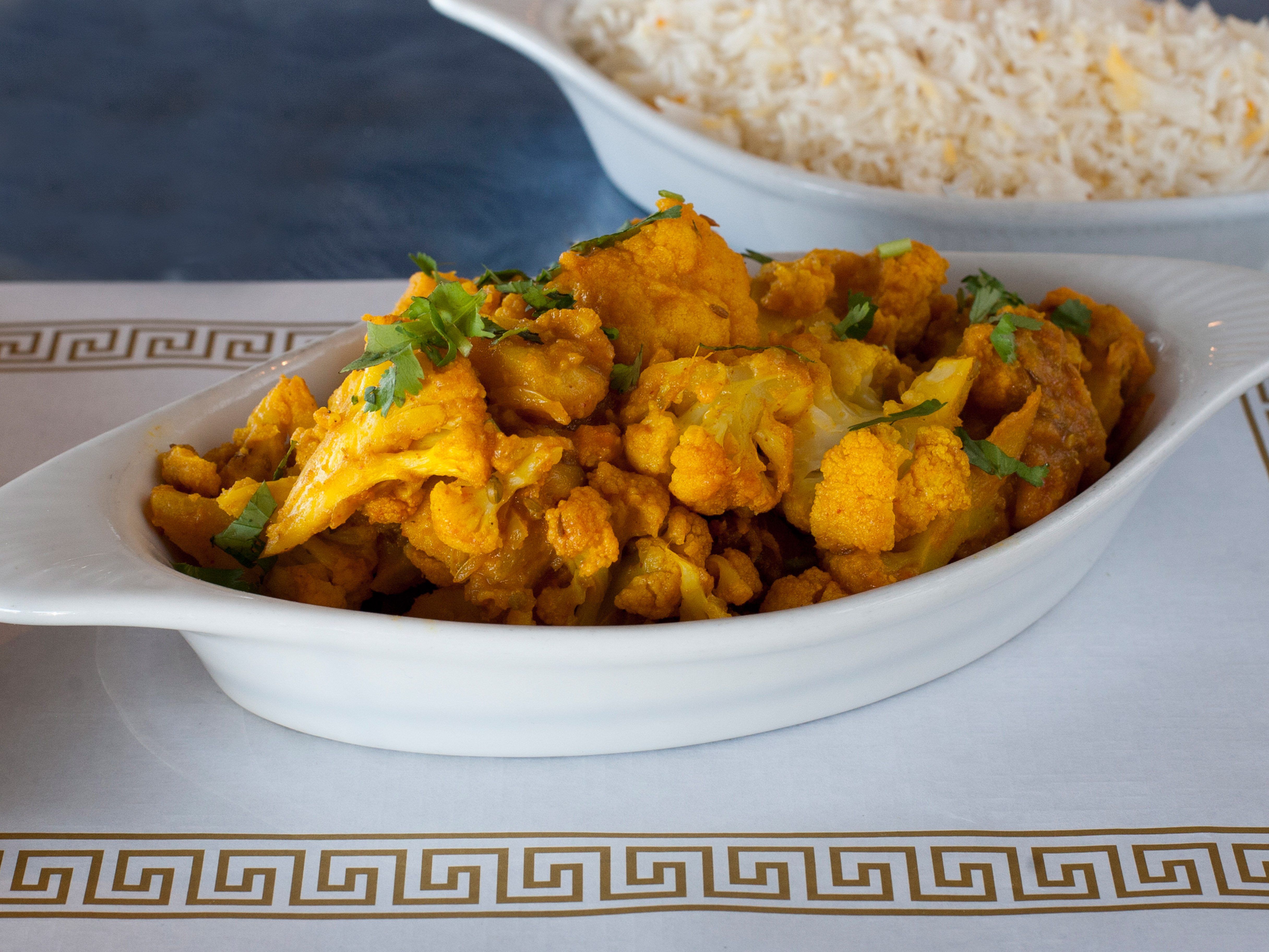 Order Aloo Gobhi food online from Taj Mahal store, Kansas City on bringmethat.com