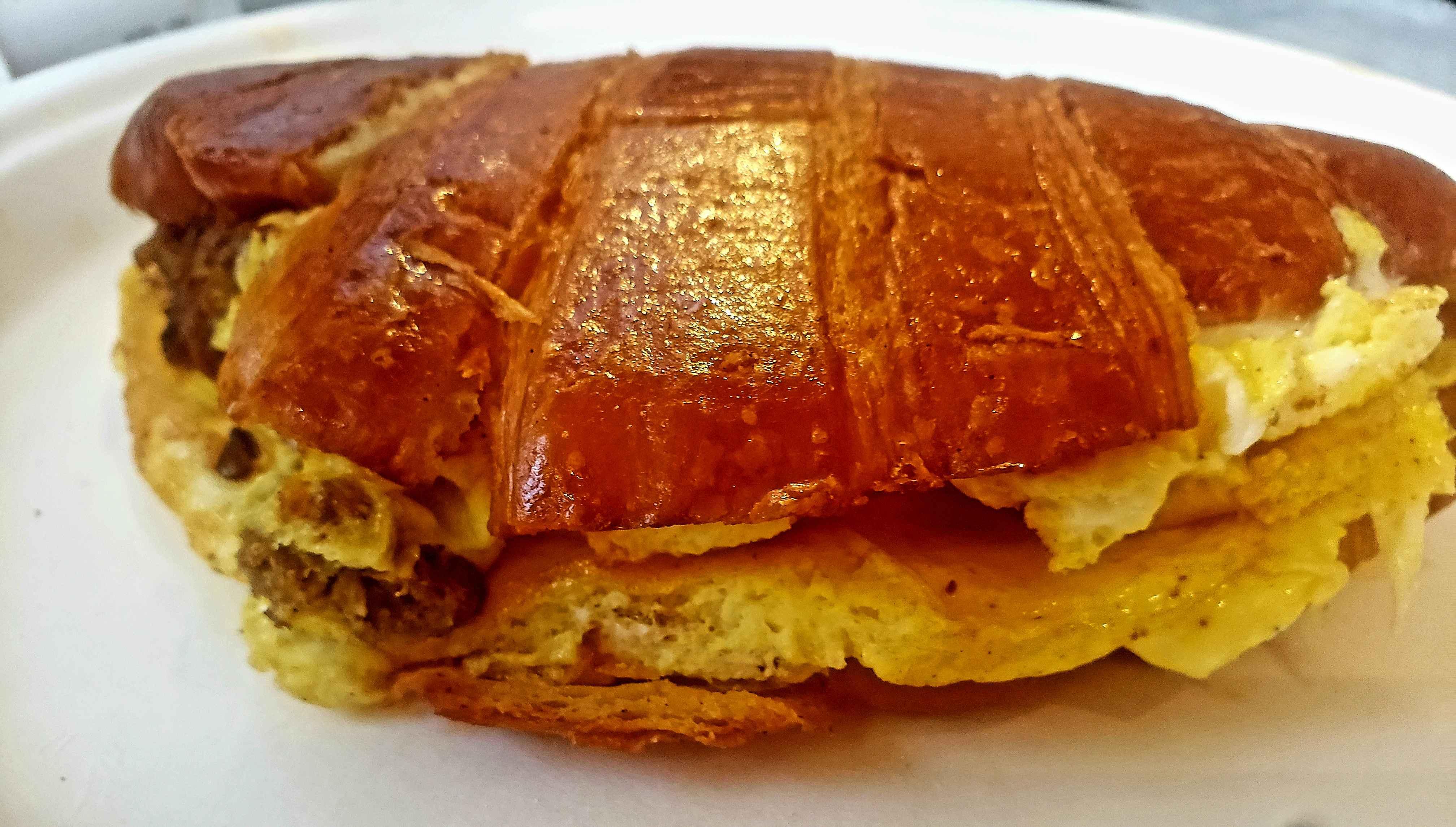 Order Sausage Egg and Cheese Croissant food online from Manakeesh Cafe Bakery store, Philadelphia on bringmethat.com