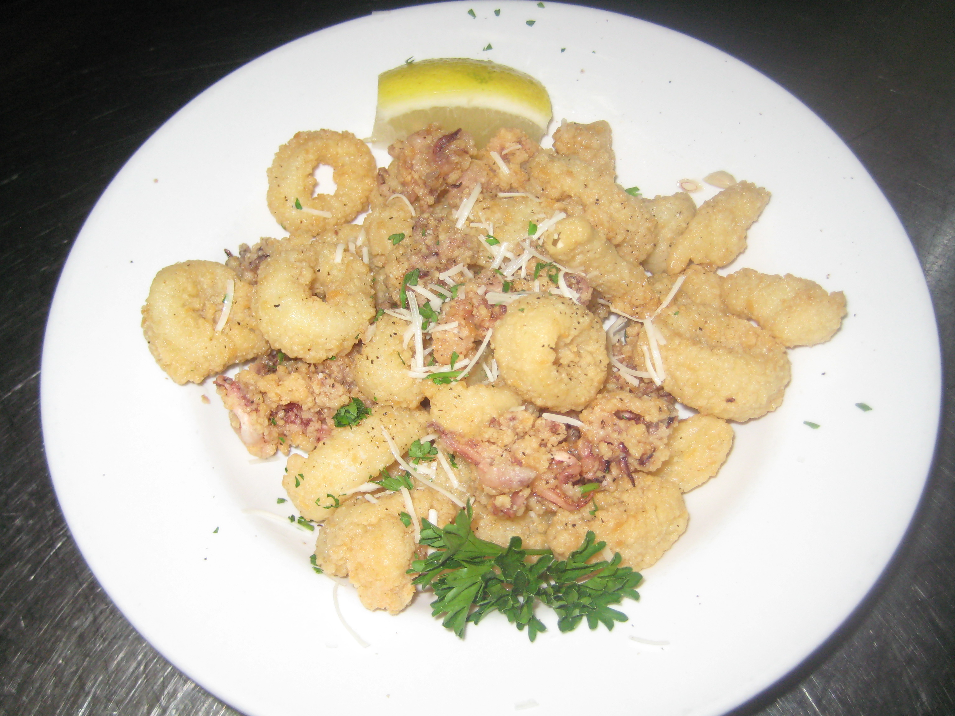 Order Fried Calamari food online from Nicolosi's Italian Restaurant store, San Diego on bringmethat.com