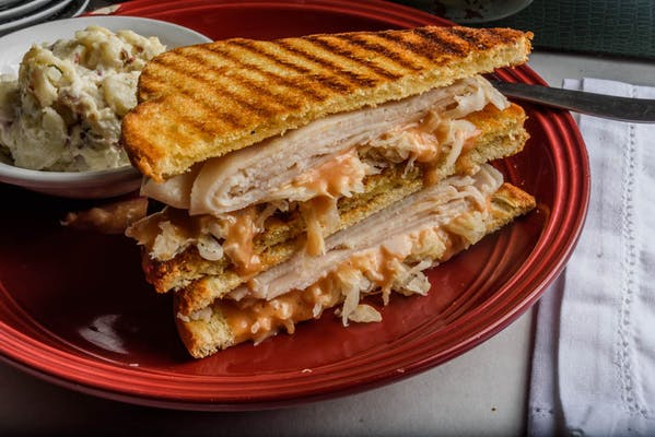 Order Turkey Ranch Panini food online from Customs Cafe store, Hoover on bringmethat.com