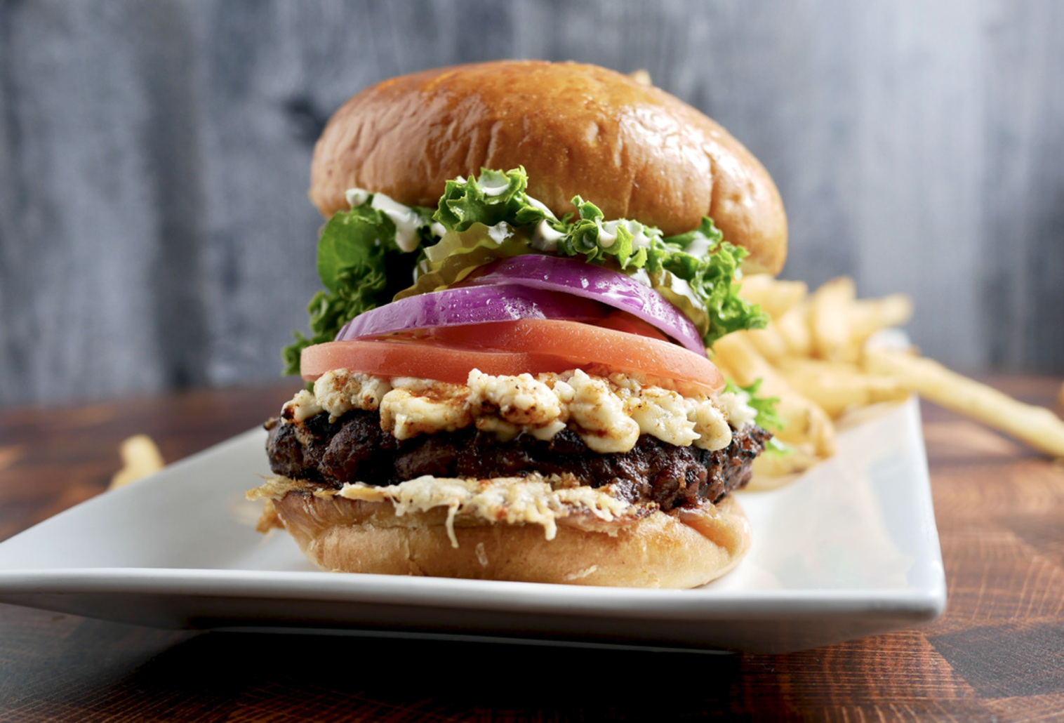 Order Belushi Black and Blue Burger food online from Kocky Bar & Grill store, Fresno on bringmethat.com