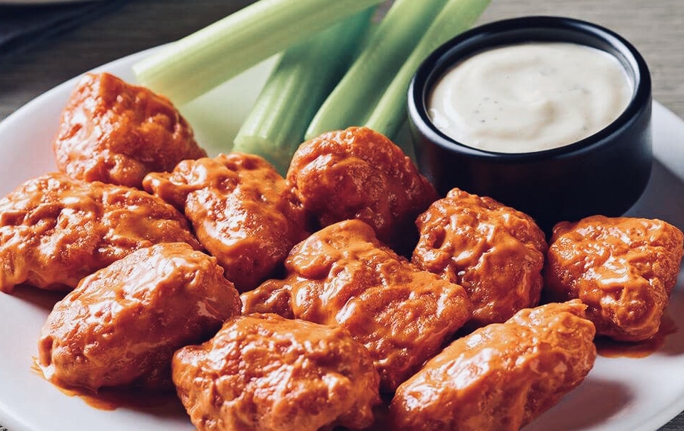 Order 12 Buffalo Style Boneless Wings food online from The Dugout store, Ossining on bringmethat.com