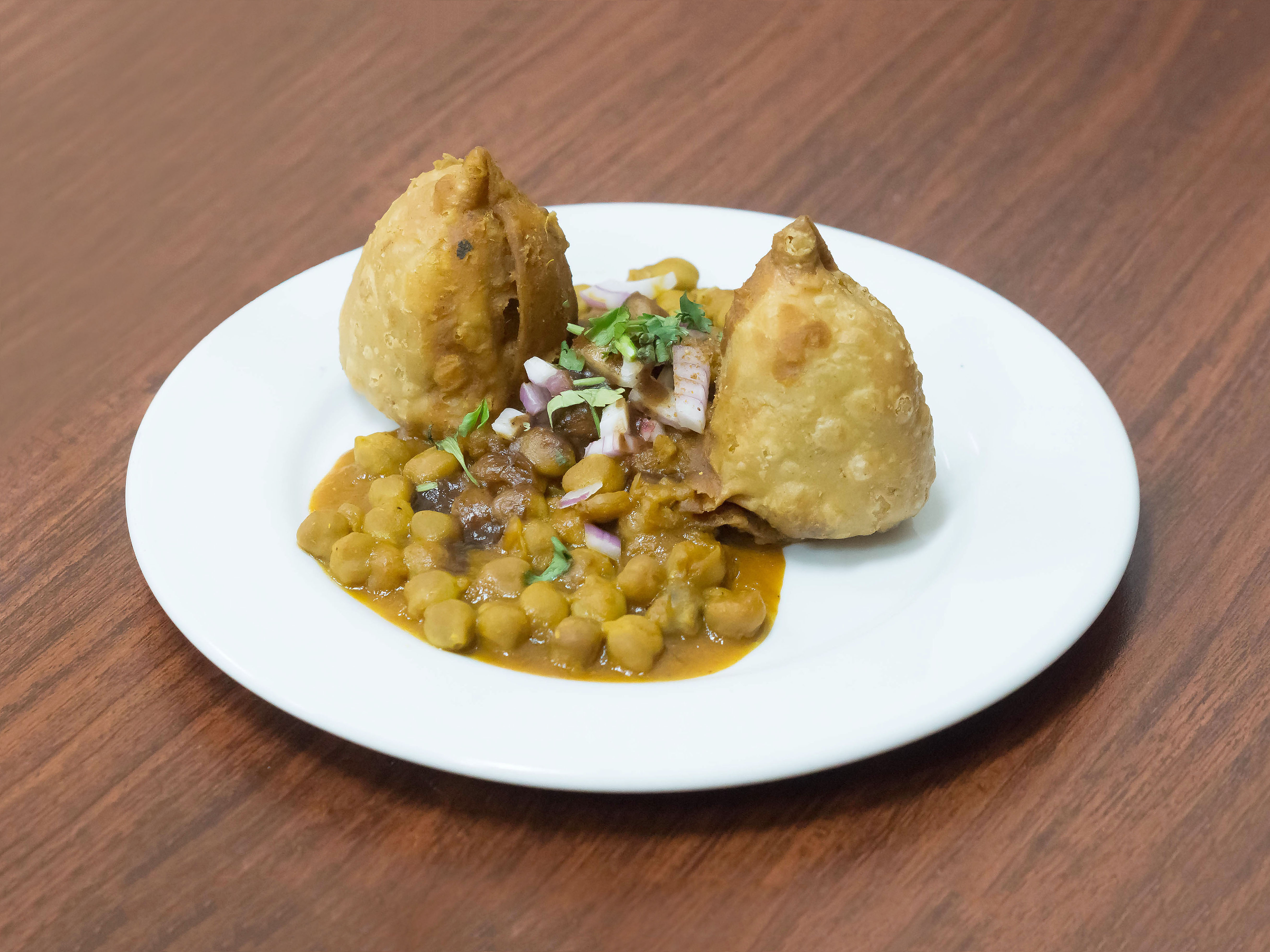 Order 1. Samosa Chana food online from Standard Sweets & Spices store, Fresno on bringmethat.com