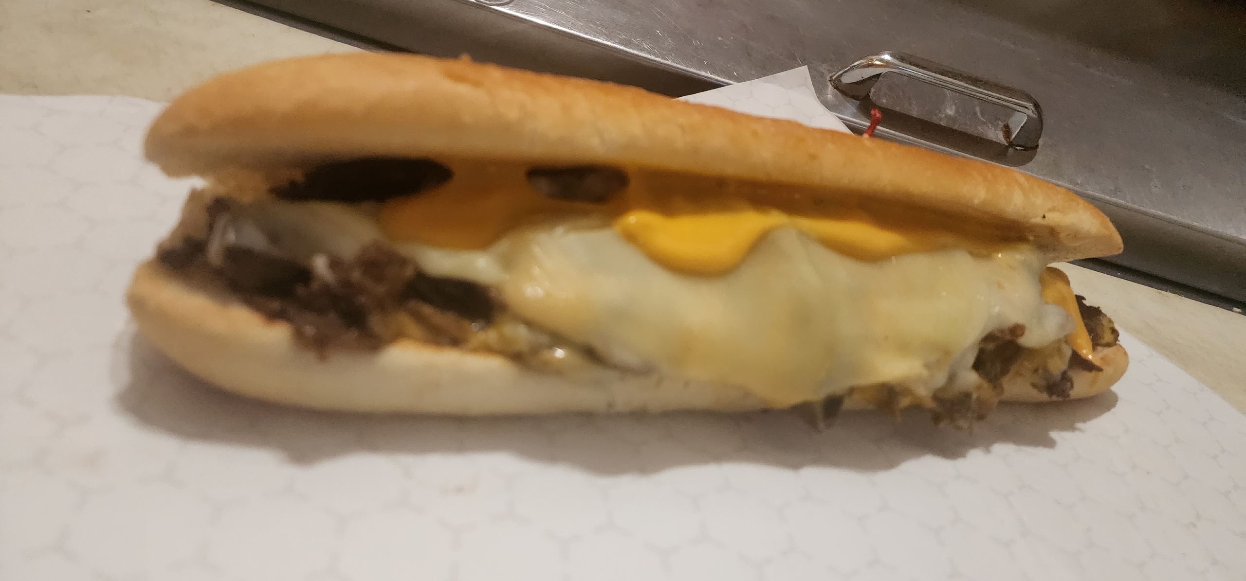 Order *NEW* Cheesesteak sandwich food online from Dark Side Of The Moo store, Jersey City on bringmethat.com