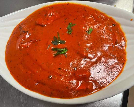 Order BUTTER CHICKEN 24 OZ food online from INDIAN GRILL RESTAURANT store, Norcross on bringmethat.com