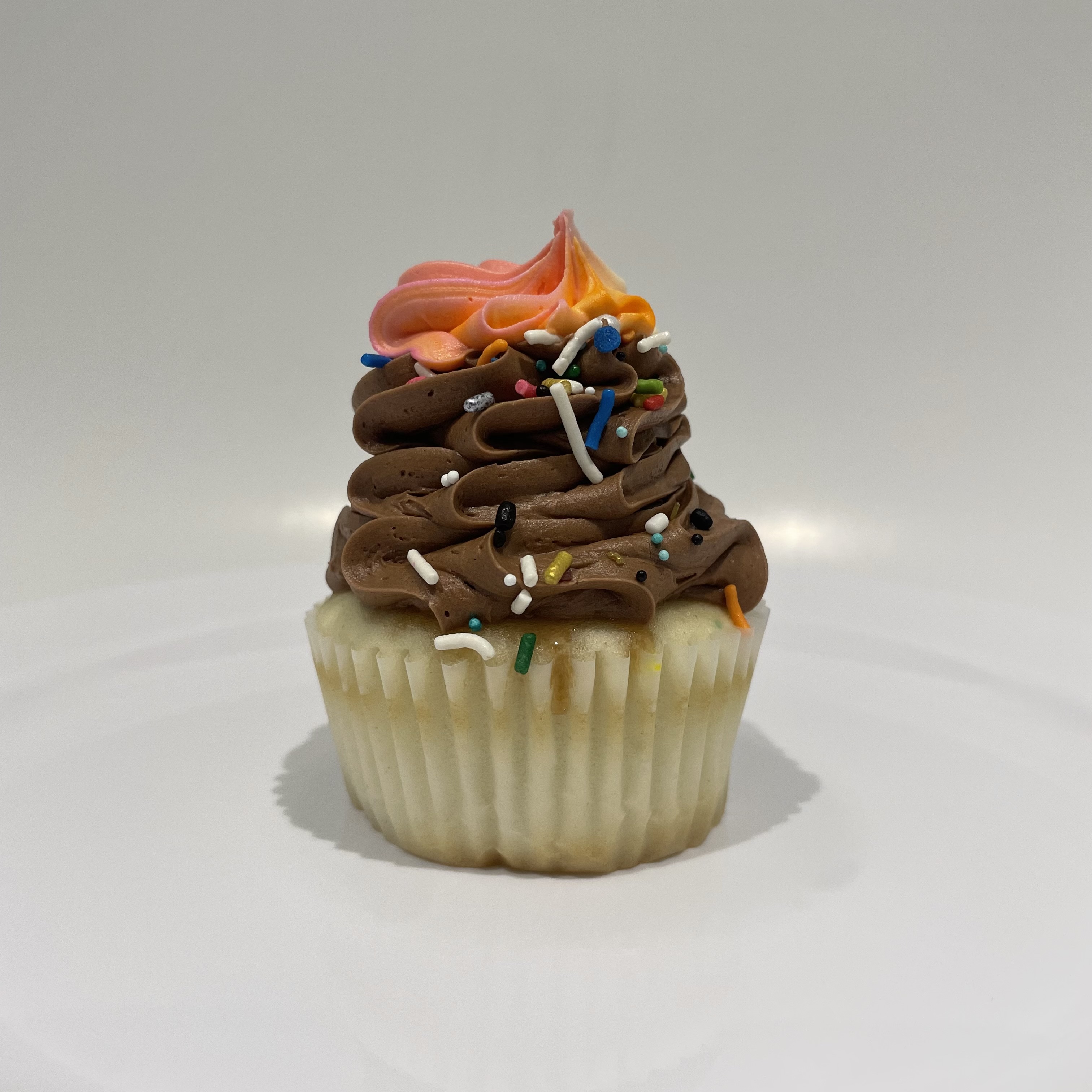 Order Vanilla Birthday Cupcake food online from The House of Cupcakes store, Princeton on bringmethat.com