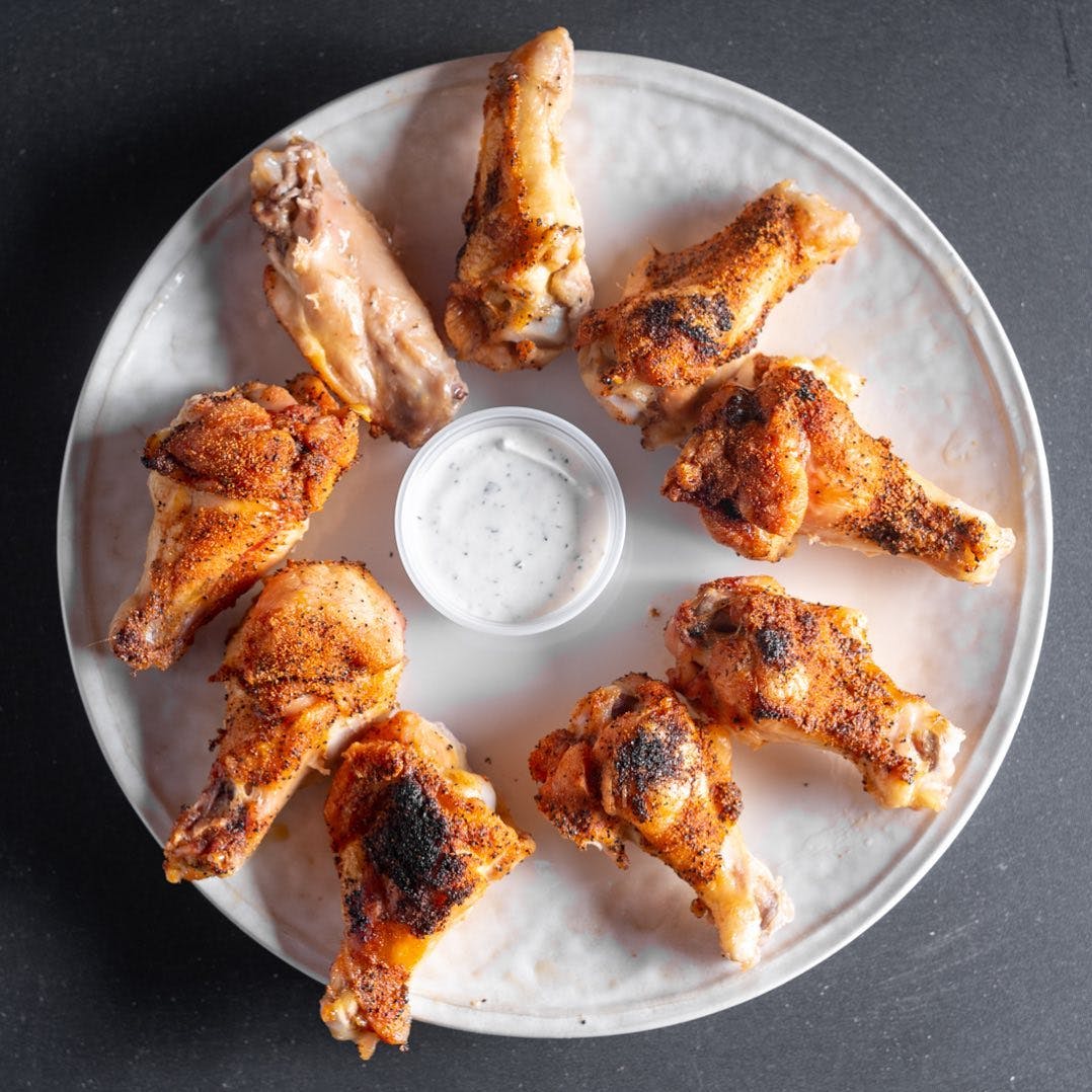Order 9. Buffalo Chicken Wings - 9 Pieces food online from Graziano Pizza Restaurant store, Mira Loma on bringmethat.com