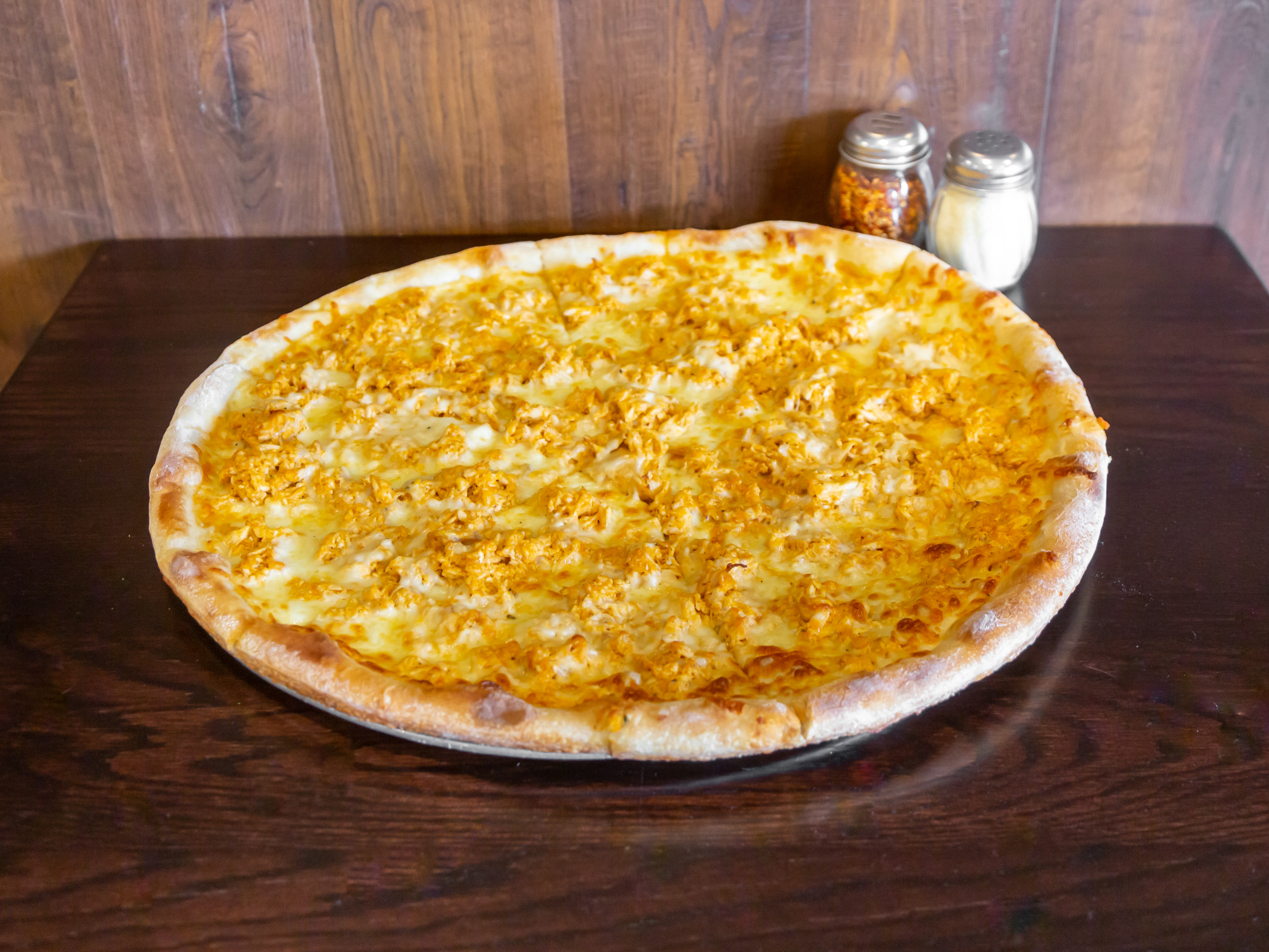 Order Large Buffalo Chicken Pizza food online from Illiano Pizzeria & Restaurant store, Colchester on bringmethat.com