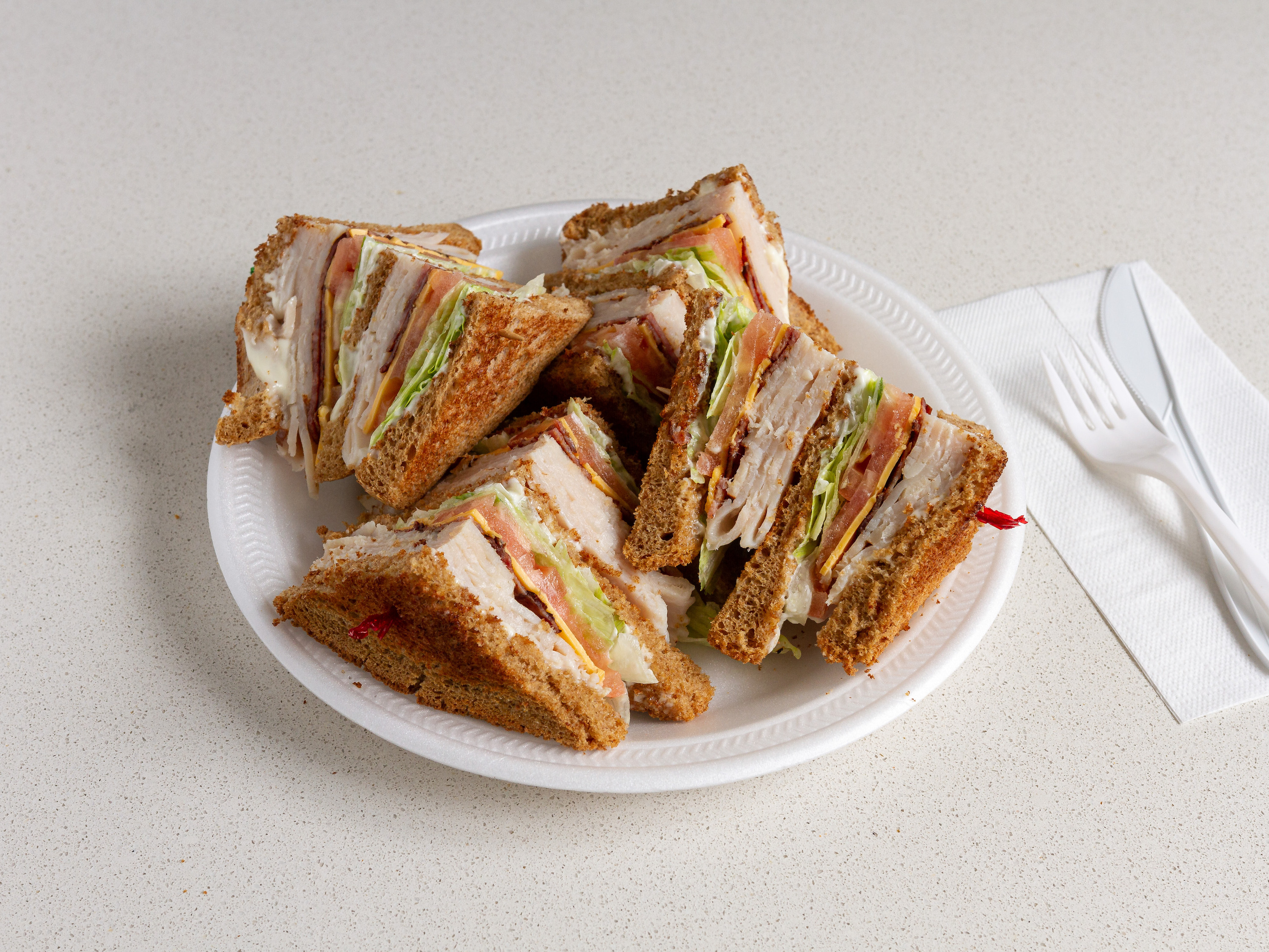 Order Turkey Club Sandwich food online from Natural Choice Deli store, Baltimore on bringmethat.com