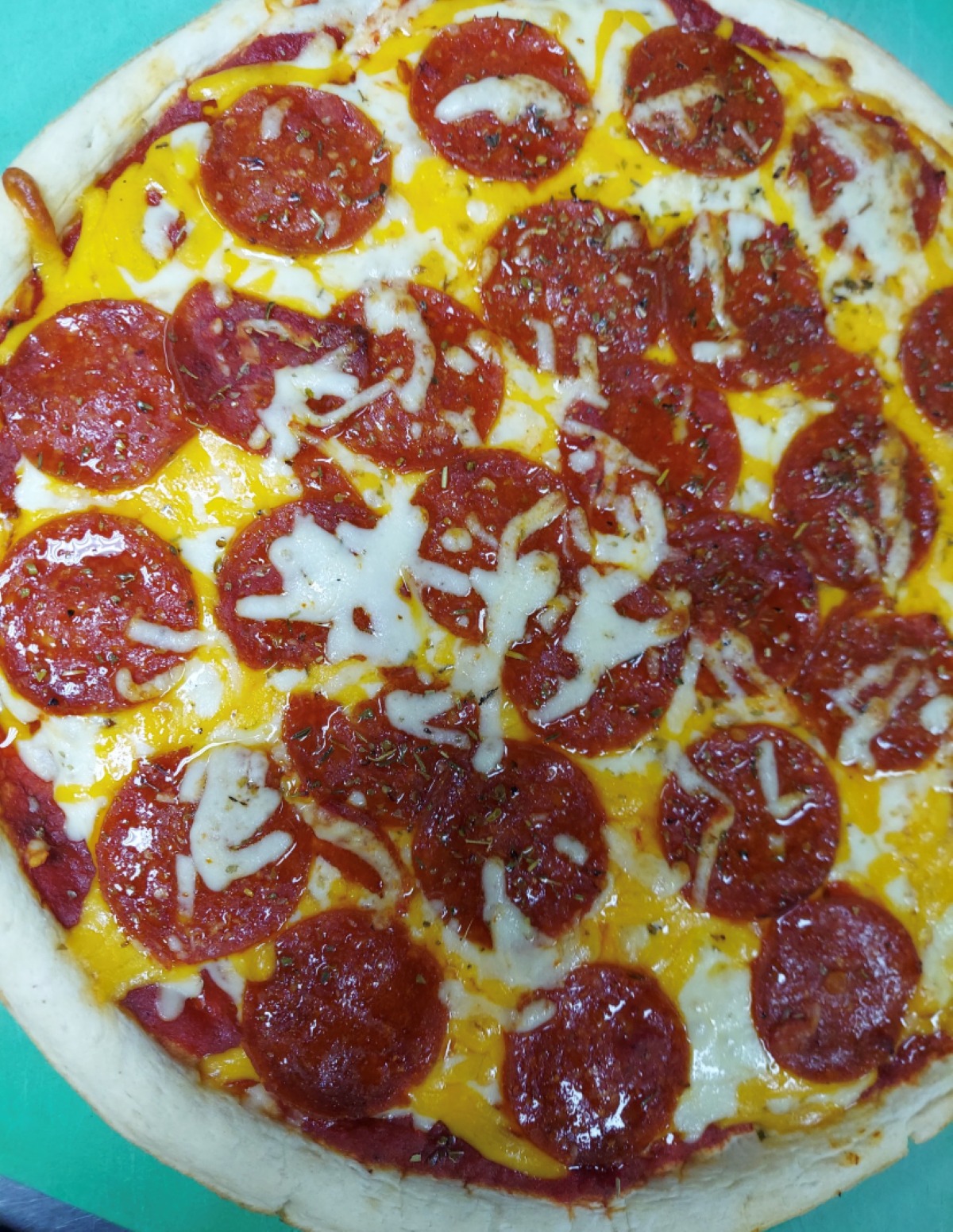 Order Pepperoni Pizza food online from Bookworms Cafe store, Mountain Home on bringmethat.com