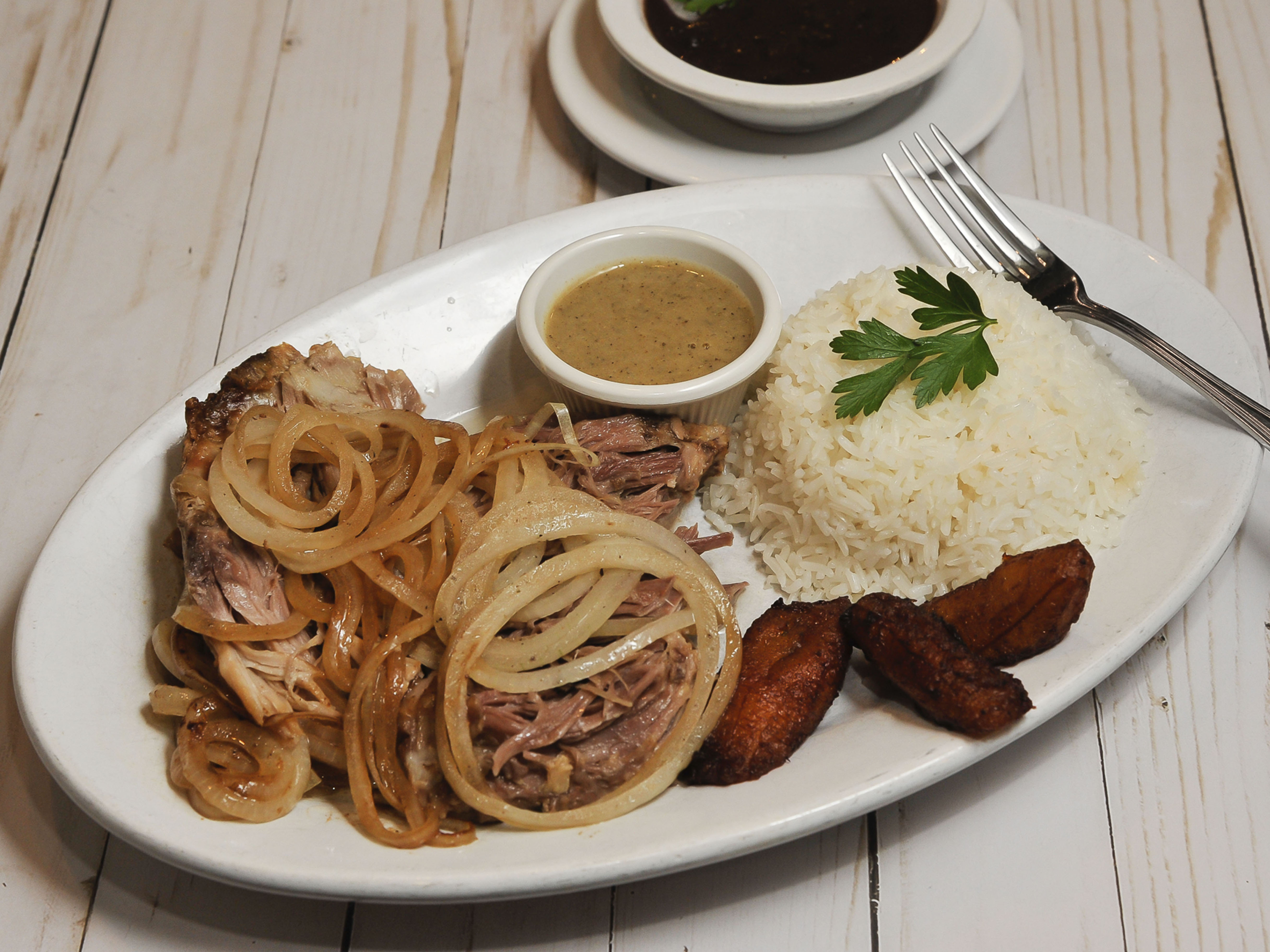 Order Roast Pork food online from Lazaro Cuban Cuisine store, Roswell on bringmethat.com
