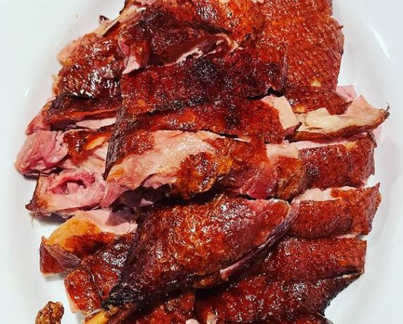 Order Half Chinese Tea-Smoked Duck 樟茶鸭半只 food online from The Mandarin store, Menlo Park on bringmethat.com