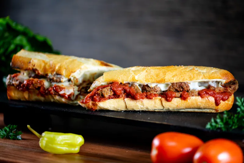 Order 12" Meatball Parm Toasted Hero Sandwich food online from Ski and Benny Pizza store, Anchorage on bringmethat.com