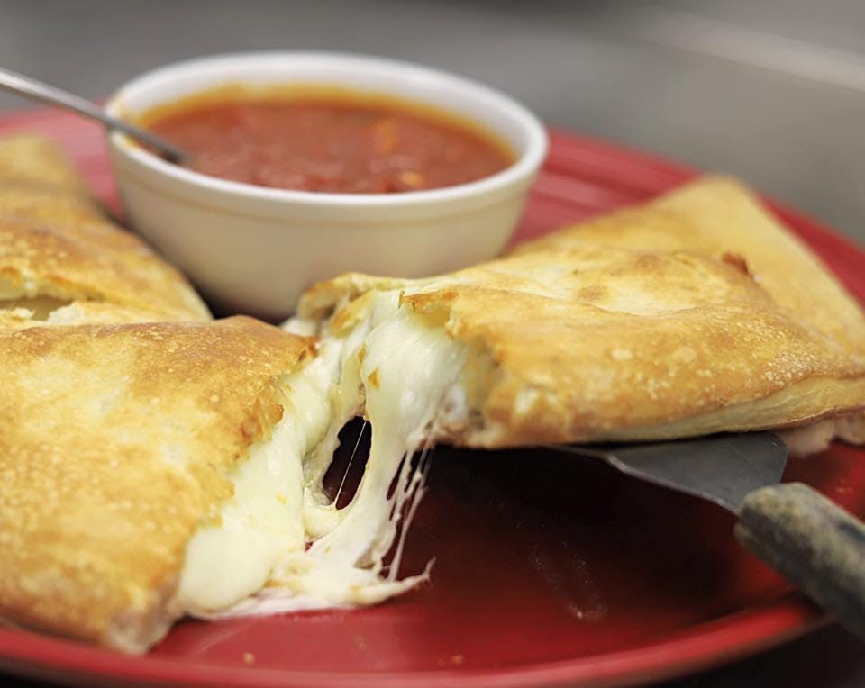 Order Baked Cheese Turnover Calzone - Large food online from Elizabeth's Pizza store, Greensboro on bringmethat.com