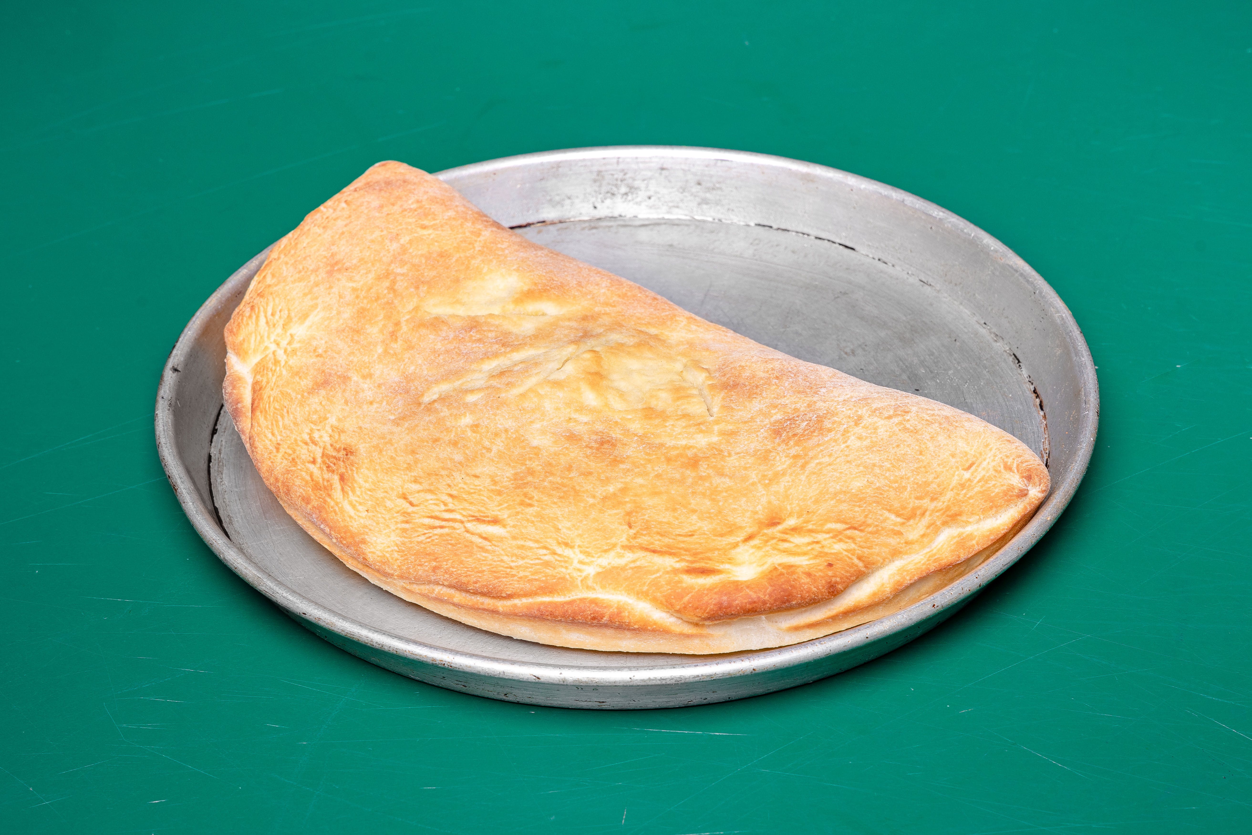 Order Calzone - Small 9" food online from Selentis Pizza store, Lorain on bringmethat.com