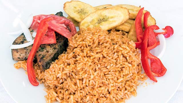 Order Jellof Rice food online from Pat Delicious African Restaurant store, Columbus on bringmethat.com