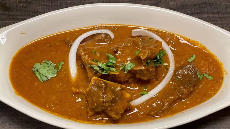 Order Goat Curry food online from New India Restaurant store, Columbus on bringmethat.com