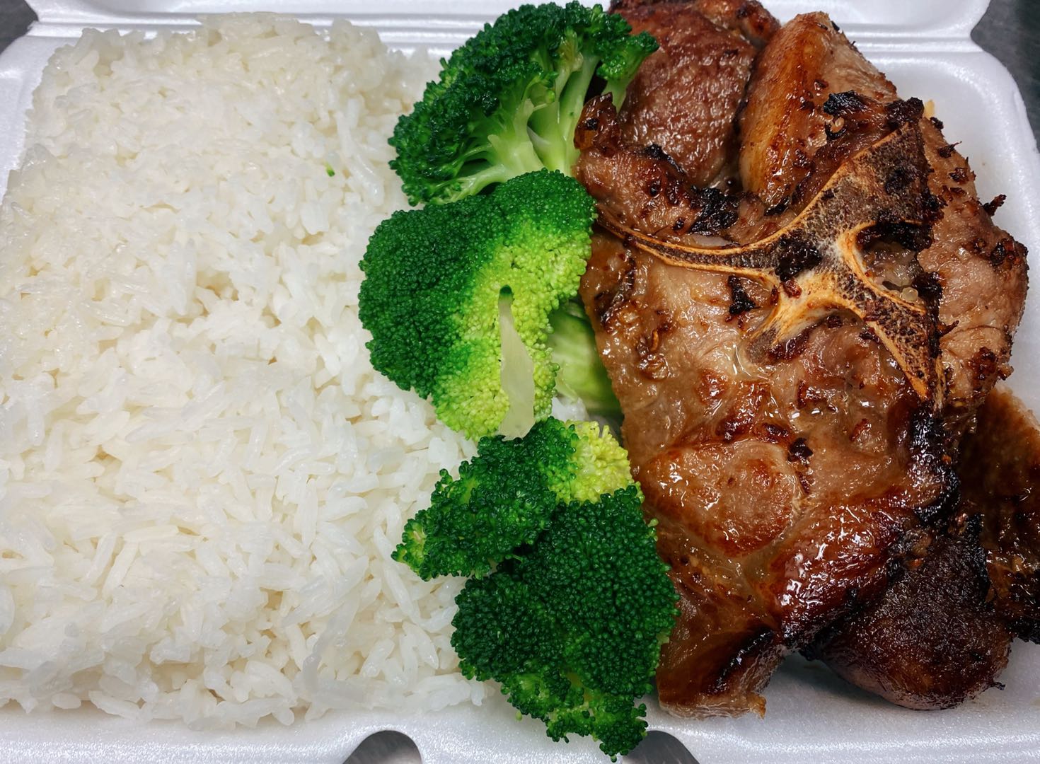 Order Pork Chop over Rice  food online from Pearl Chinese Restaurant store, Raleigh on bringmethat.com