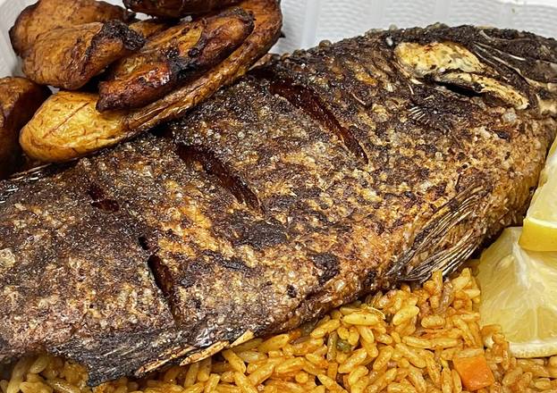 Order Tilapia fish with jollof rice and plantain food online from Kilimanjaro Grill store, Minneapolis on bringmethat.com