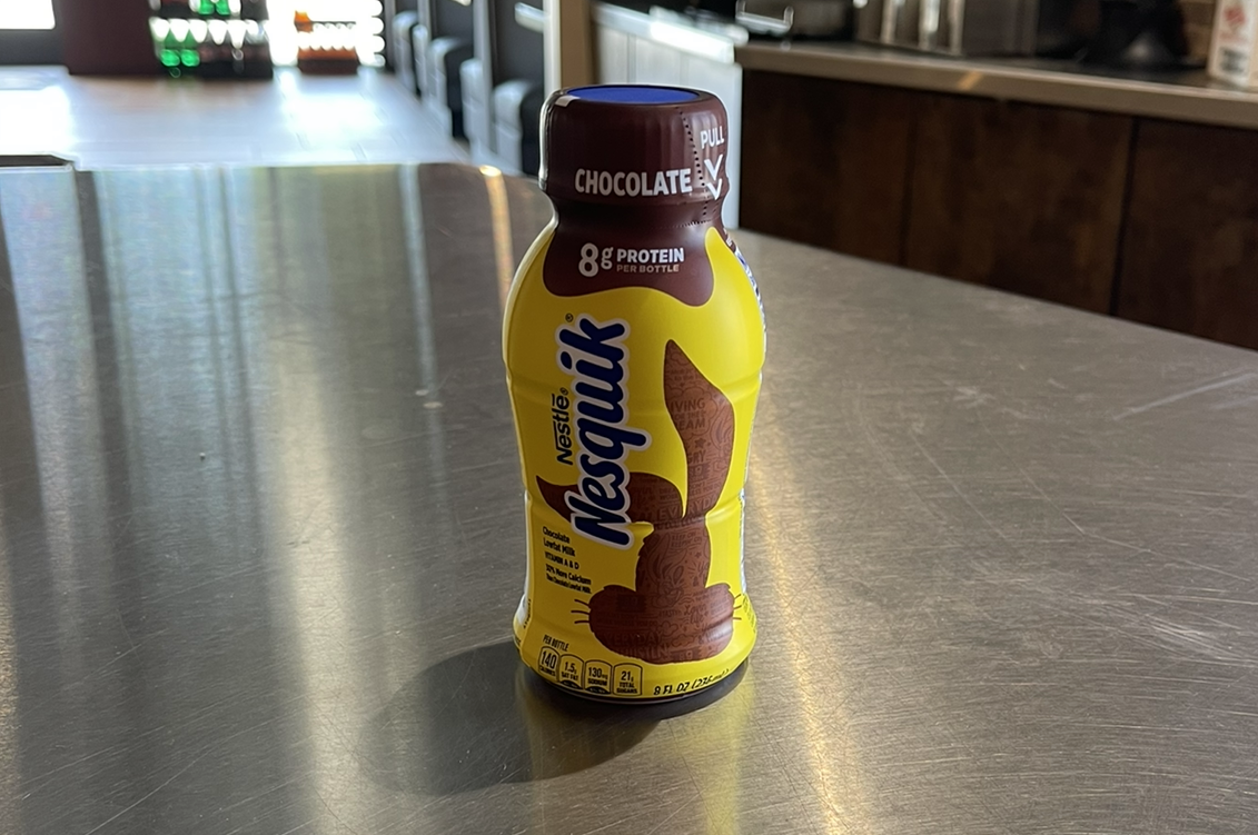 Order NesQuik Chocolate Milk food online from Johnny's Pizza store, Cary on bringmethat.com