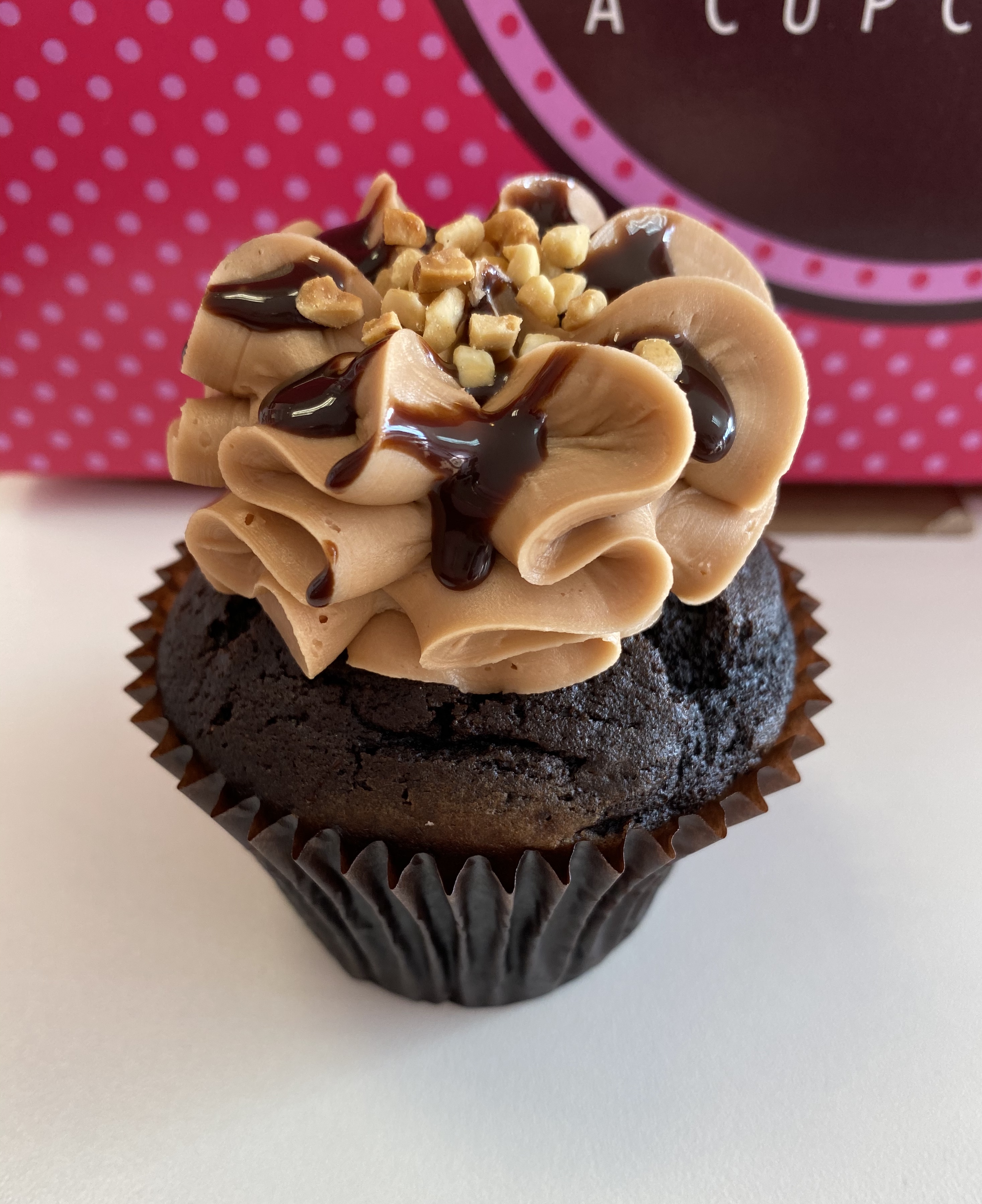 Order Snickers Gluten Free Friendly Cupcake food online from Smallcakes store, Richmond on bringmethat.com
