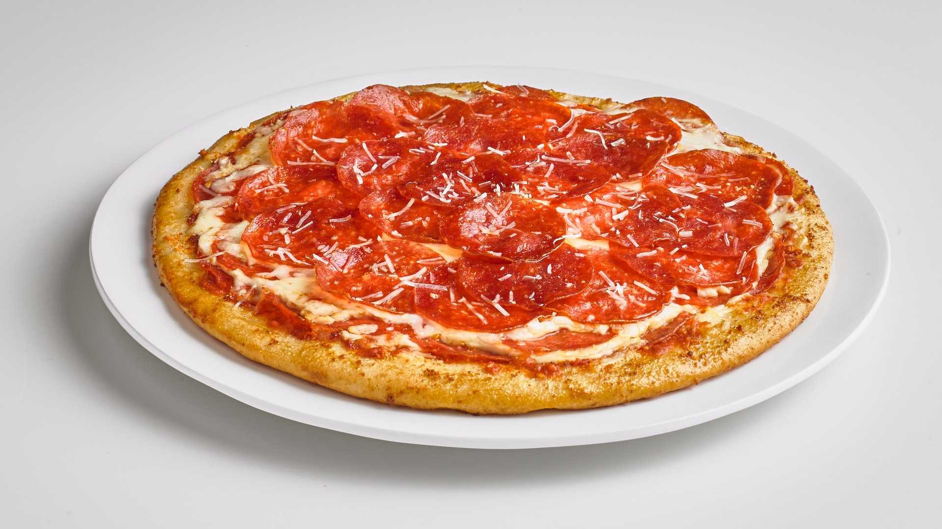 Order Ultimate Pepperoni Pizza - Individual 8" (6 Slices) food online from Boston Restaurant & Sports Bar store, Citrus Heights on bringmethat.com