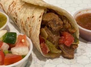 Order Carne Guisada food online from Laredo Taco Company store, Midland on bringmethat.com