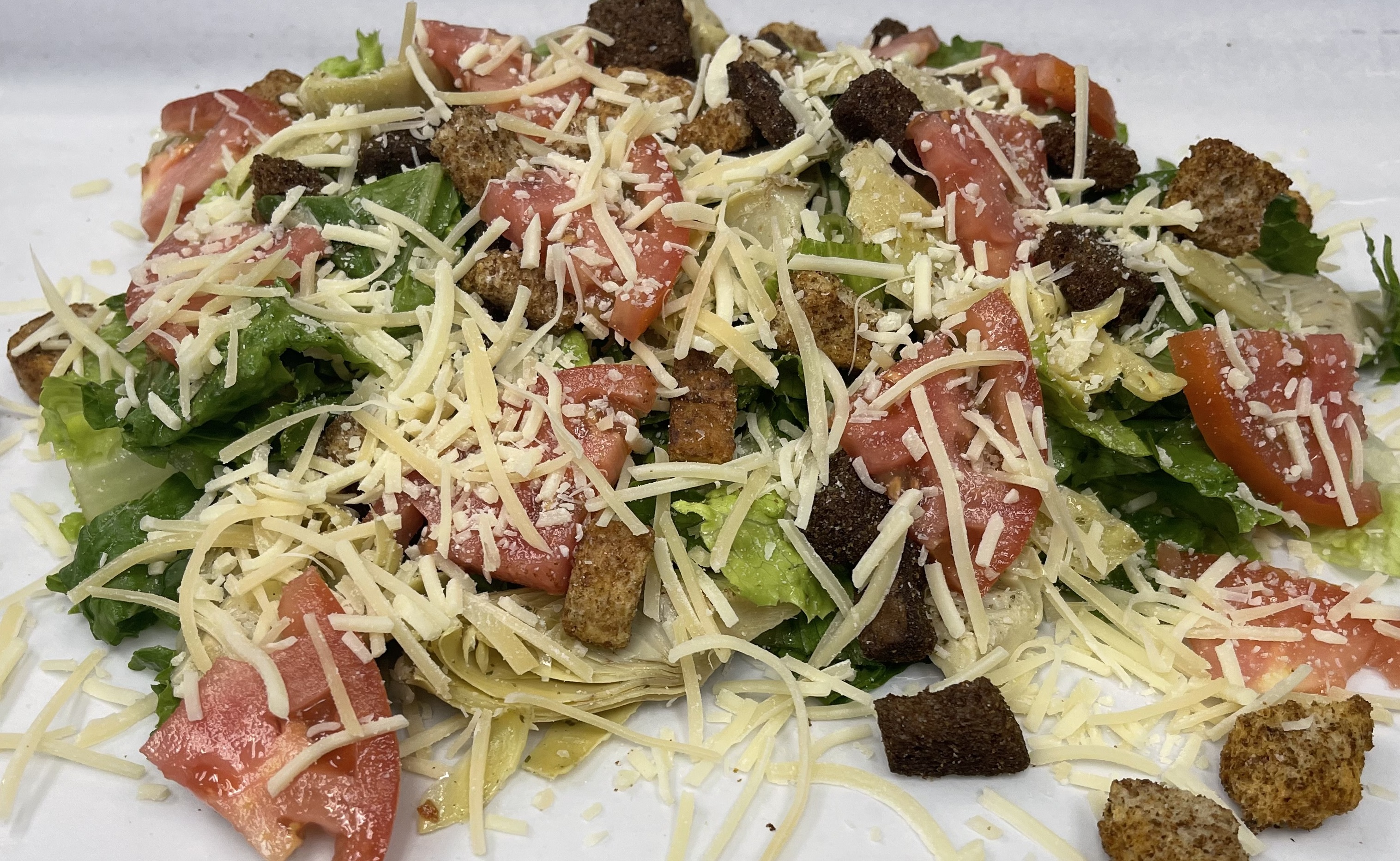 Order Regular Size Caesar Salad food online from Ameci Pizza & Pasta store, Thousand Oaks on bringmethat.com