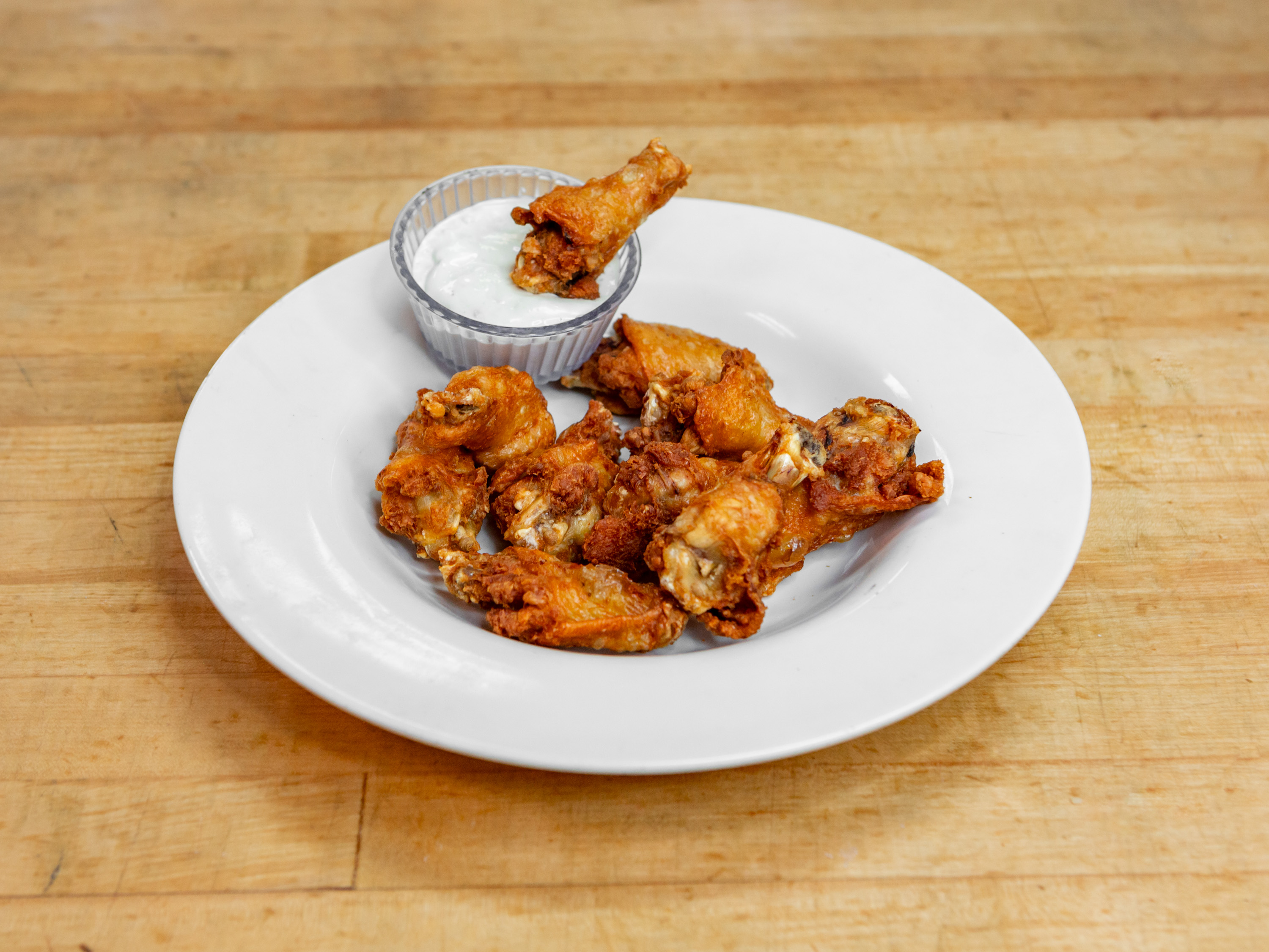 Order Chicken Wings food online from Guidos Pizza store, Anchorage on bringmethat.com