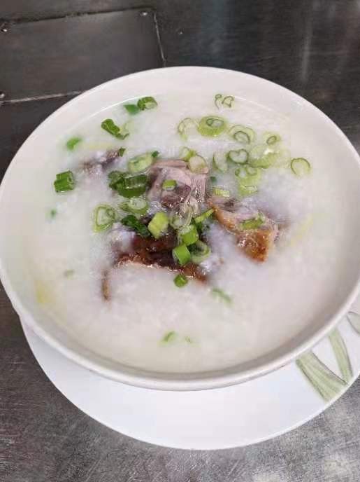 Order 180. Roast Duck Porridge food online from Kirin Chinese Restaurant store, Mountain View on bringmethat.com