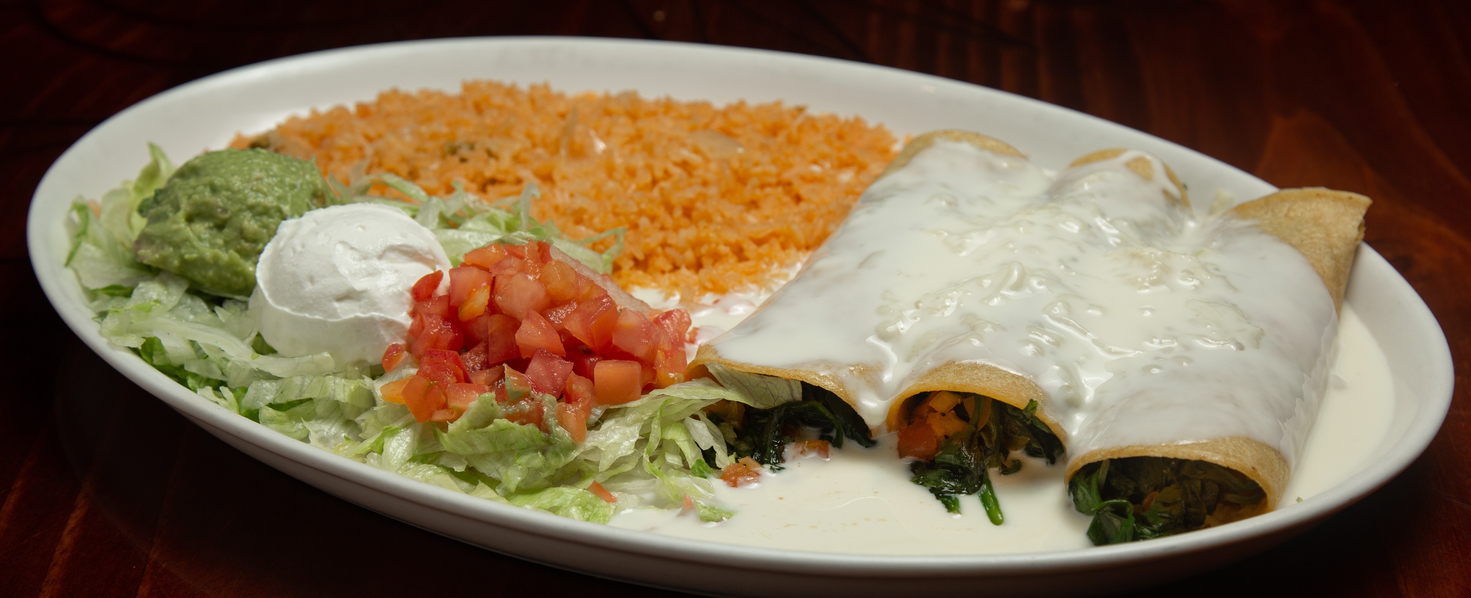 Order Spinach Enchiladas food online from Tito Mexican Restaurant store, Spring Hill on bringmethat.com