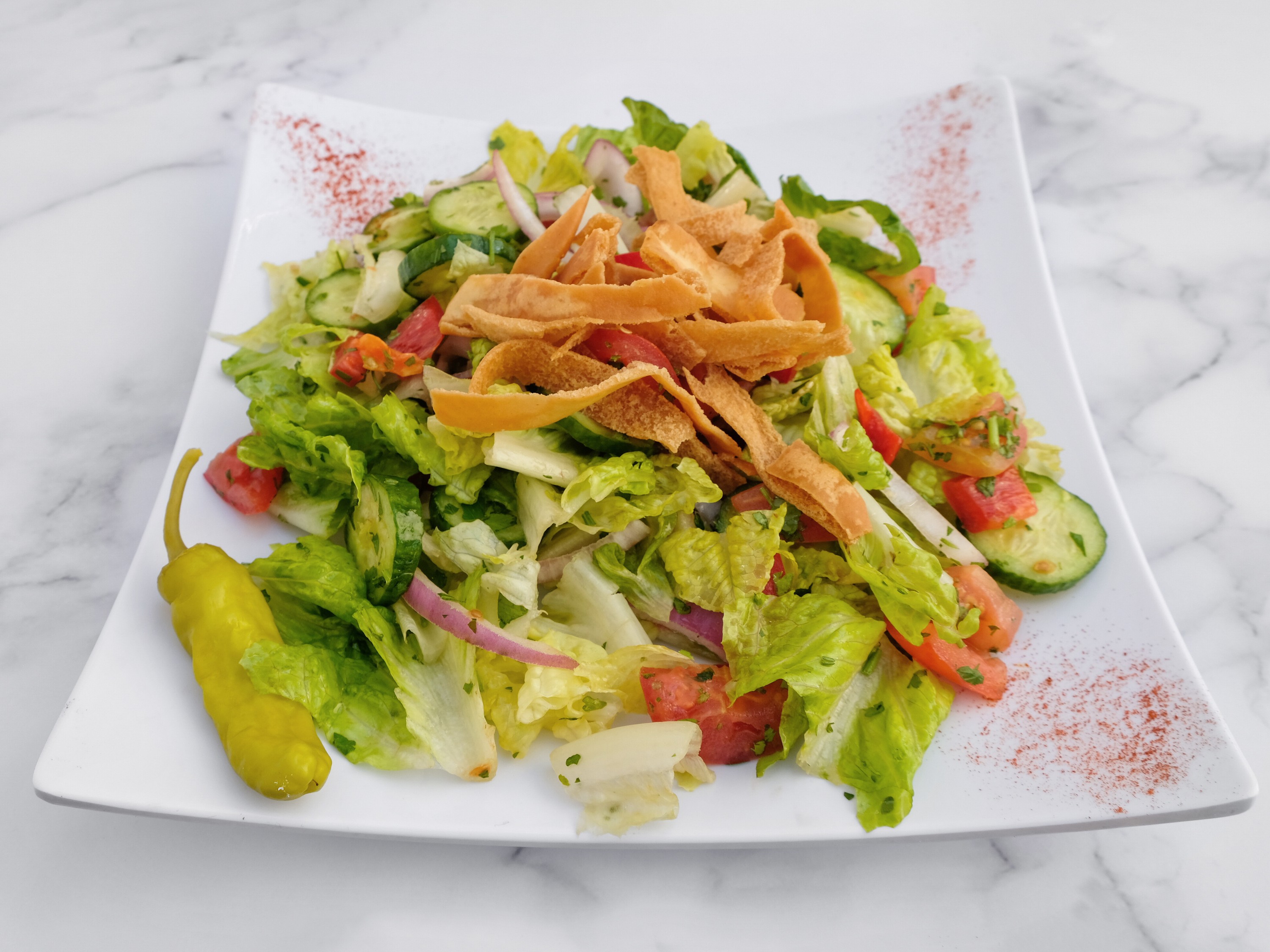 Order Fattoush Salad food online from Alwadi Cafe store, Bedford on bringmethat.com