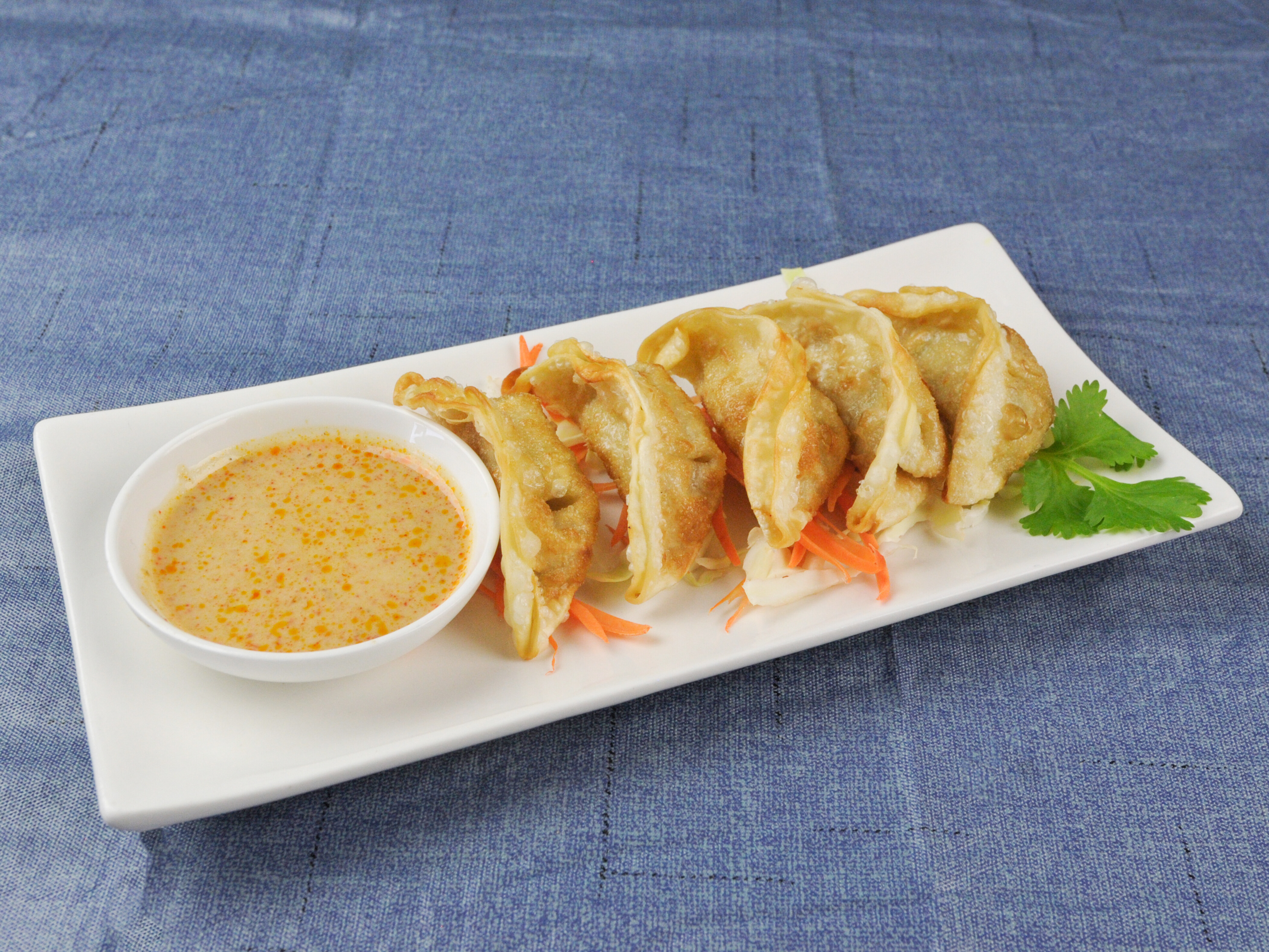 Order Curry Potstickers food online from Thai Kitchen Florissant store, Florissant on bringmethat.com