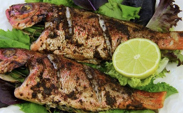 Order Snapper Fish  food online from Island Flavaz Jerk Seafood Center store, Uniondale on bringmethat.com