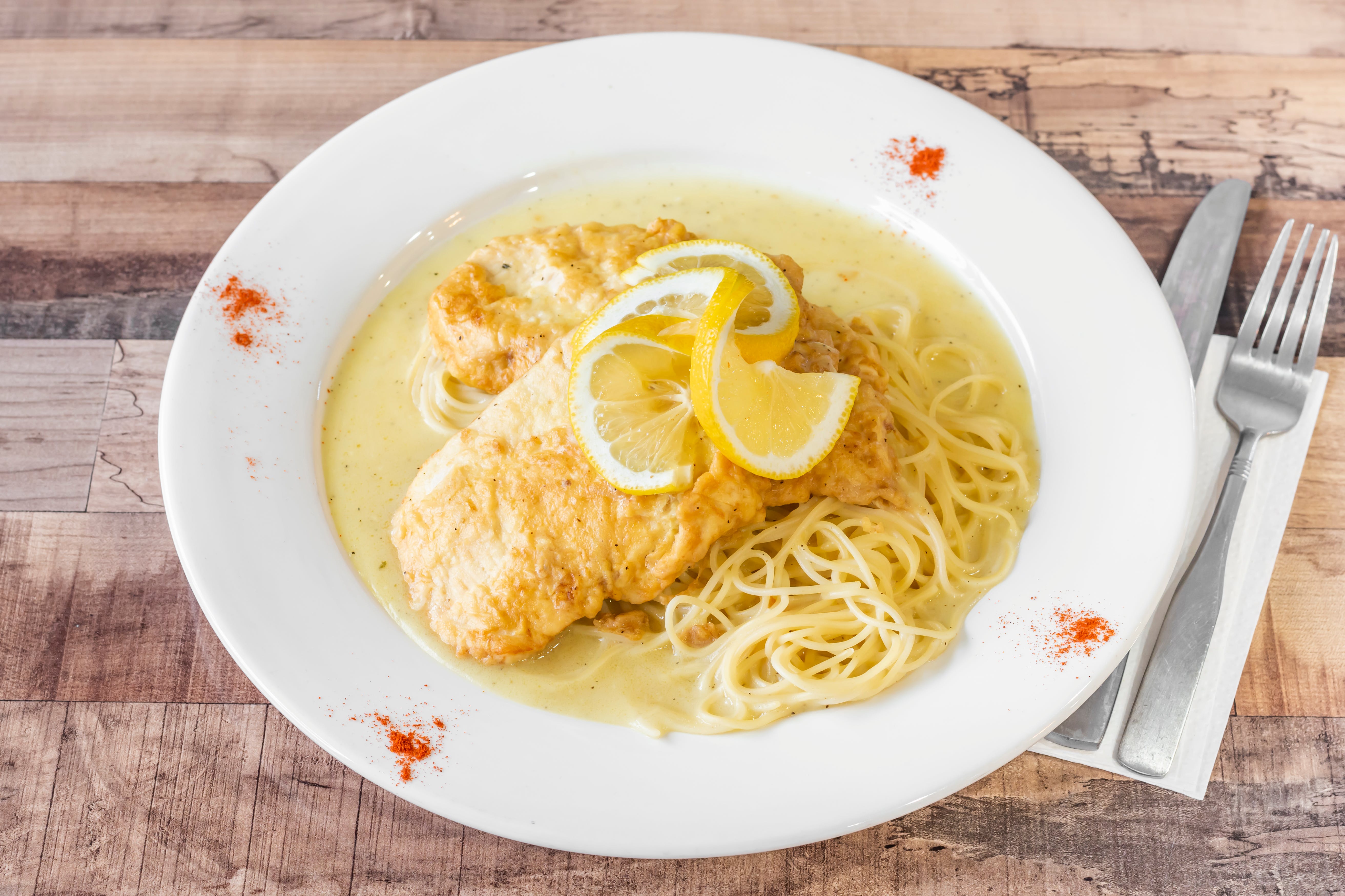 Order Chicken Francese - Entree food online from Pasquales Pizzeria store, Wall Township on bringmethat.com