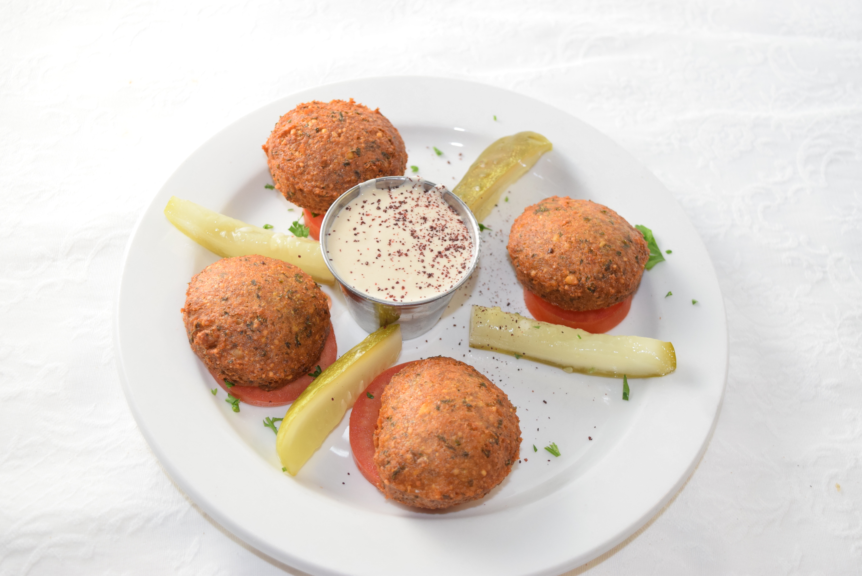 Order Side of Falafel with Tahini Sauce food online from Cafe Athena store, San Diego on bringmethat.com