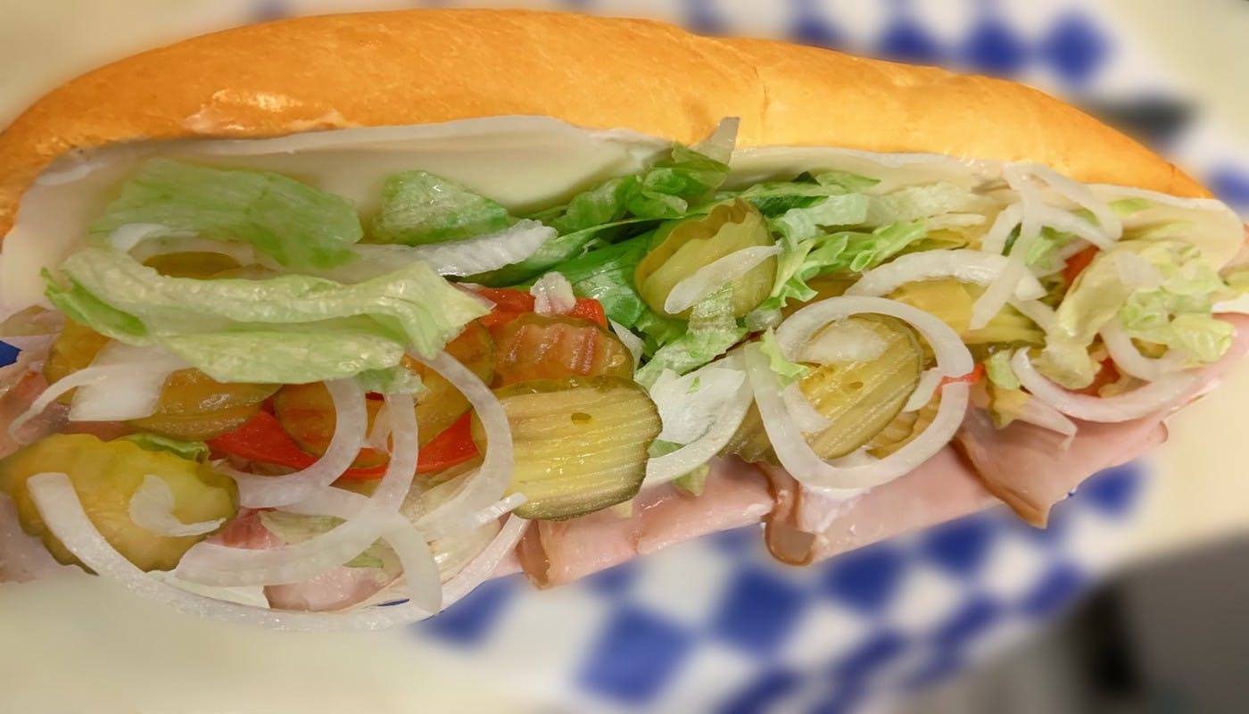 Order Smoked Turkey and Provolone Cheese Sub - Small 8" food online from Village Pizza & Seafood store, Dickinson on bringmethat.com
