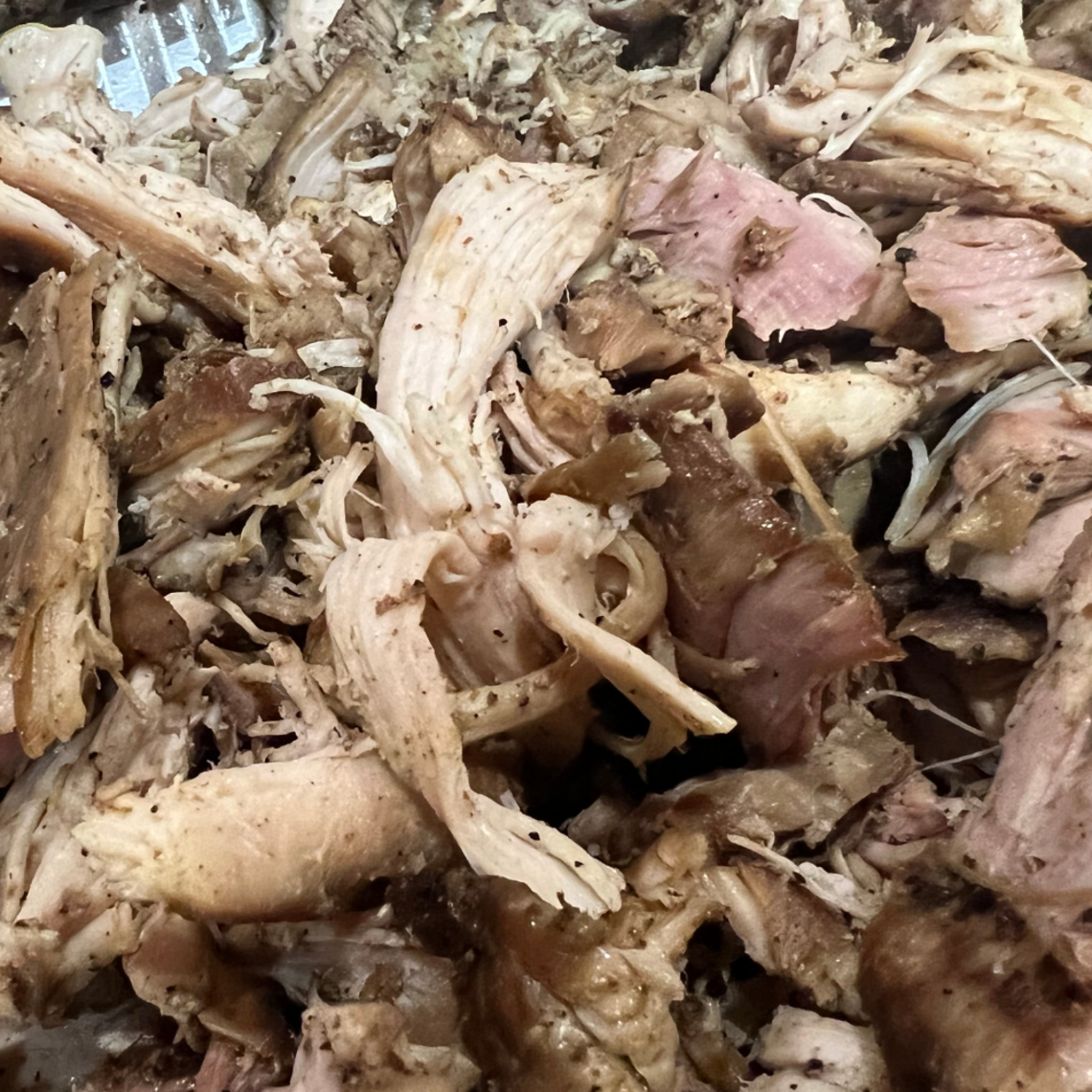 Order 1/2 Lb Pulled Chicken food online from Woodchips Express store, Oxford Charter Township on bringmethat.com