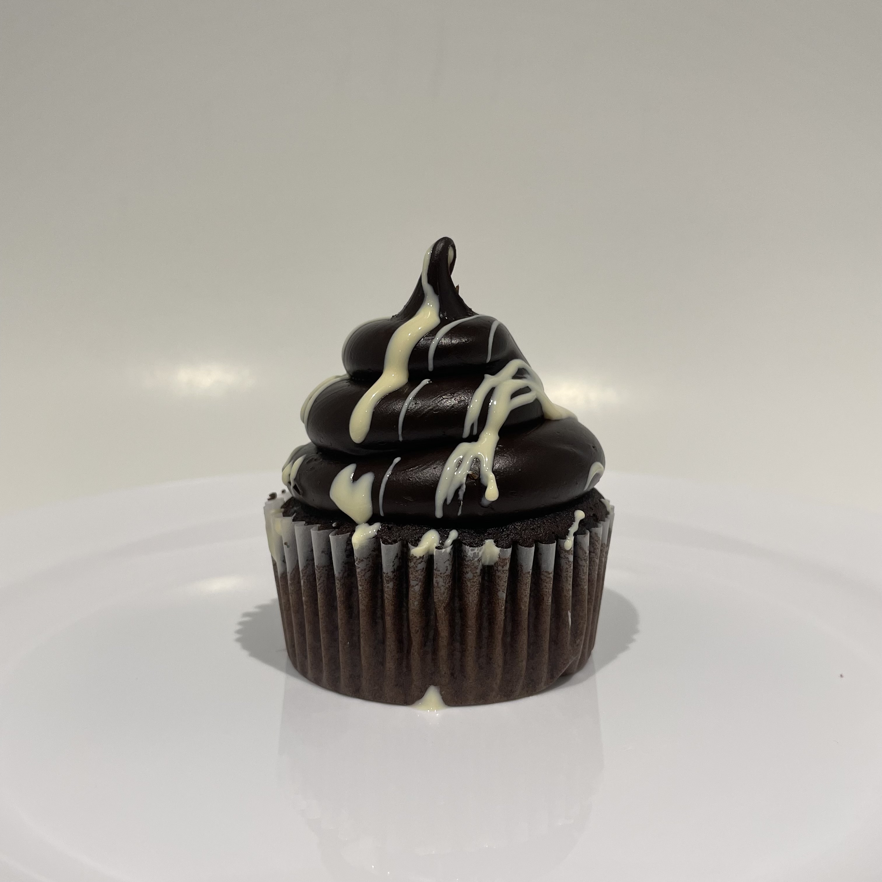Order Chocolate Brownie Cheesecake food online from The House of Cupcakes store, Princeton on bringmethat.com