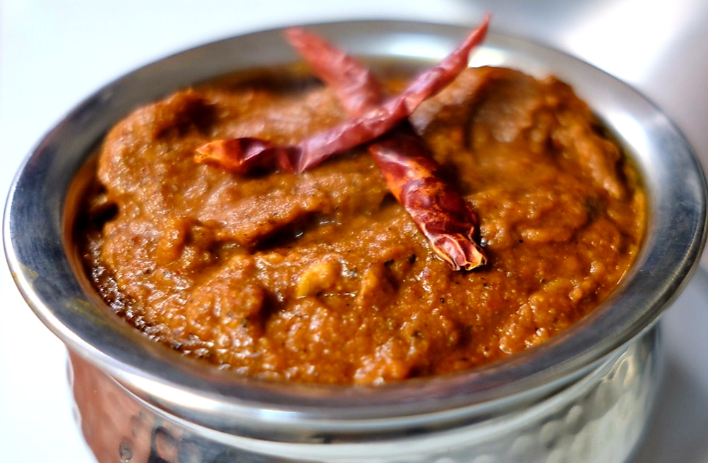 Order Chicken Vindaloo (Very spicy) food online from Sathi Indian Restaurant store, New York on bringmethat.com