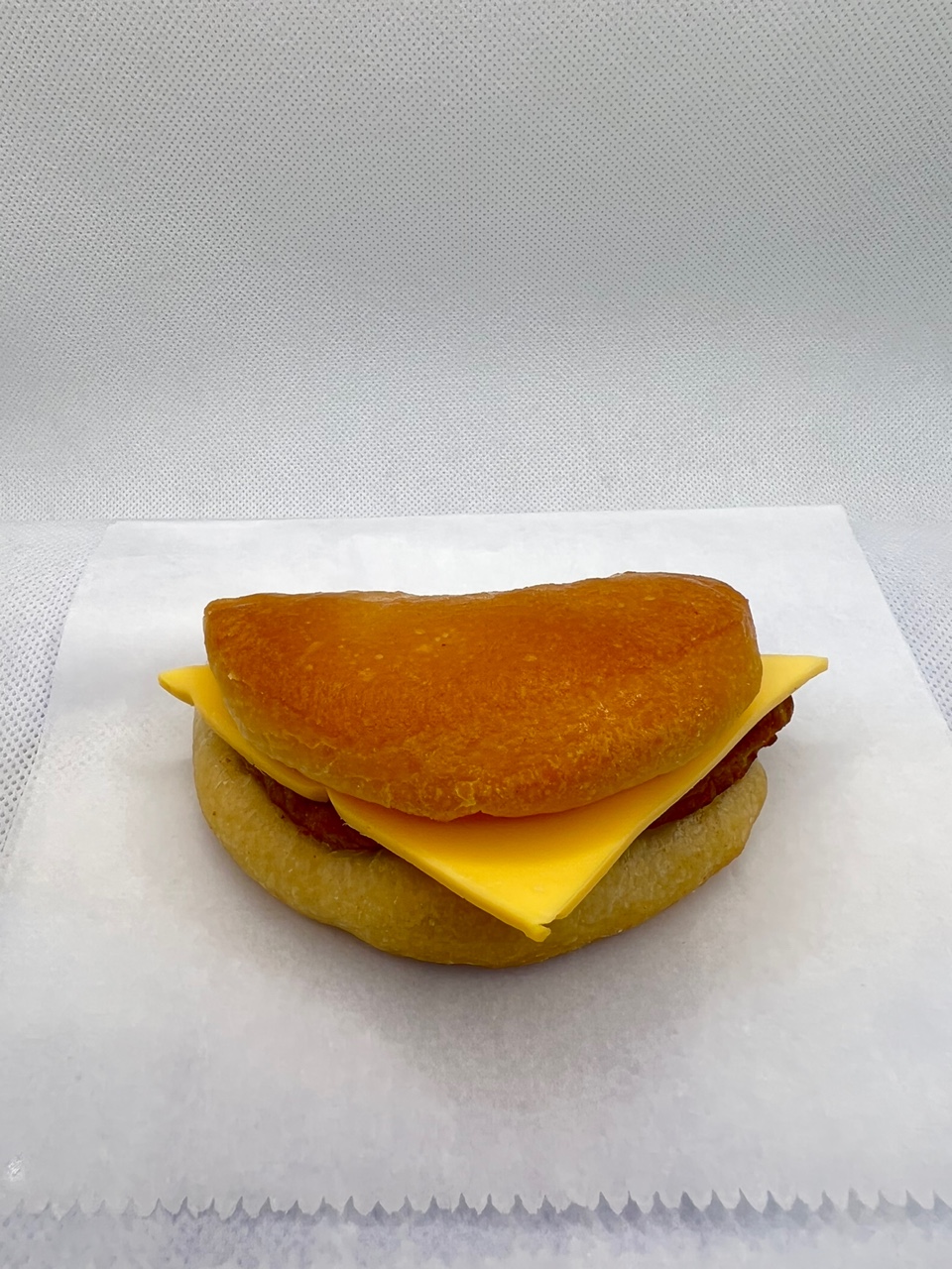 Order Sausage Cheese Biscuit  food online from Fresh & Creamy Donuts store, Lewisville on bringmethat.com