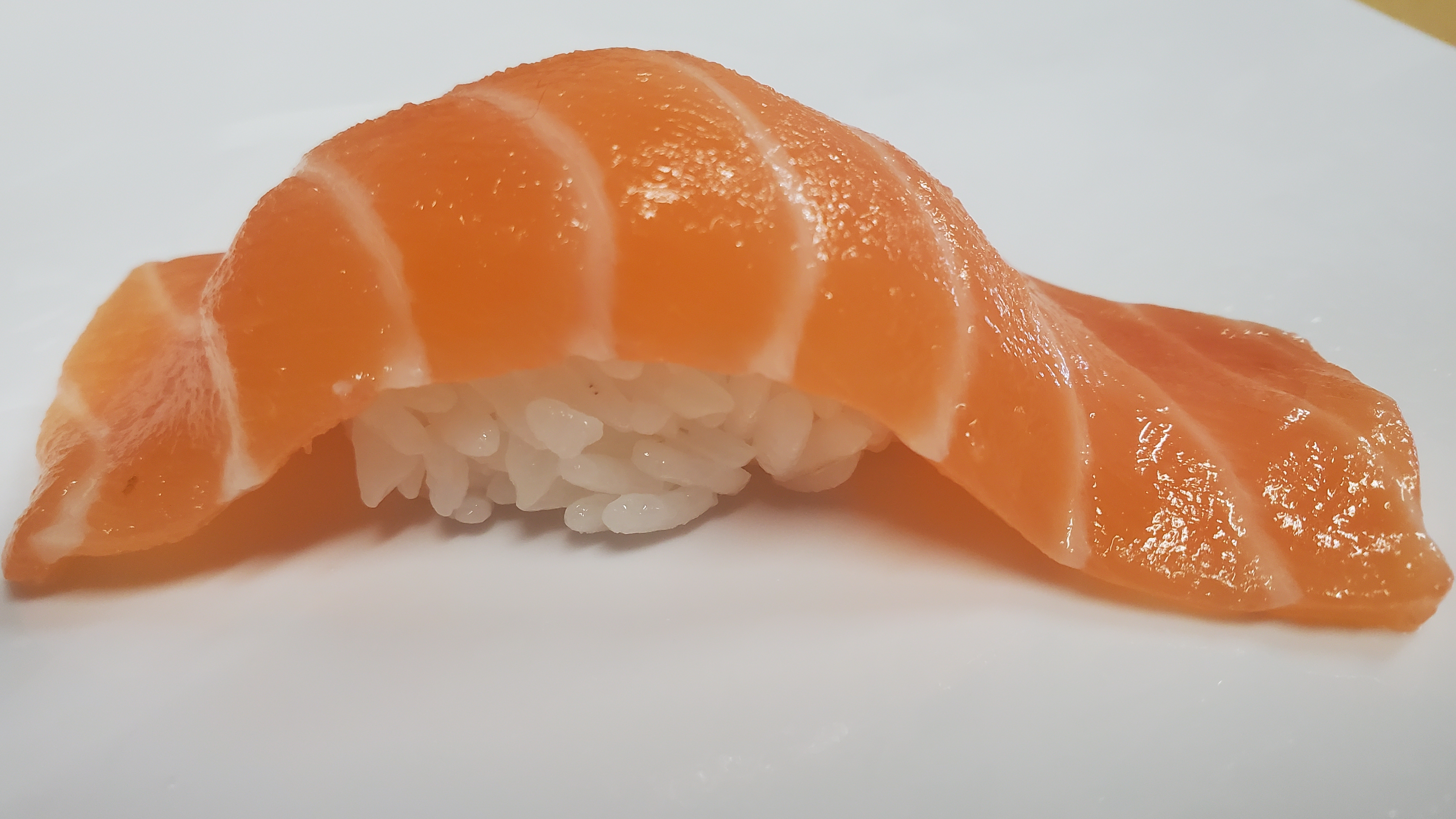 Order Salmon Sushi (3pcs) food online from Sushi Loco store, Long Beach on bringmethat.com