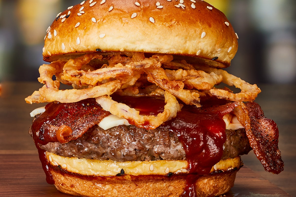 Order ‘CUE BACON CHEESEBURGER* food online from Miller Ale House store, Riverside on bringmethat.com
