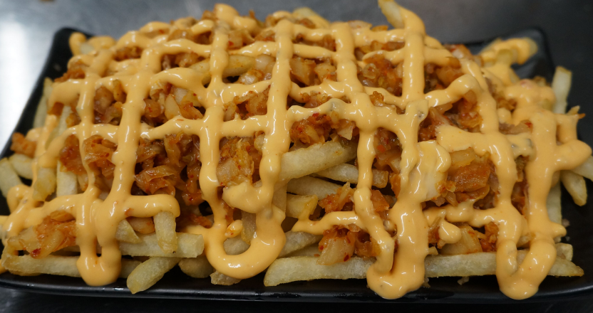 Order Kimchee fries food online from Spicy Factory store, Burlingame on bringmethat.com