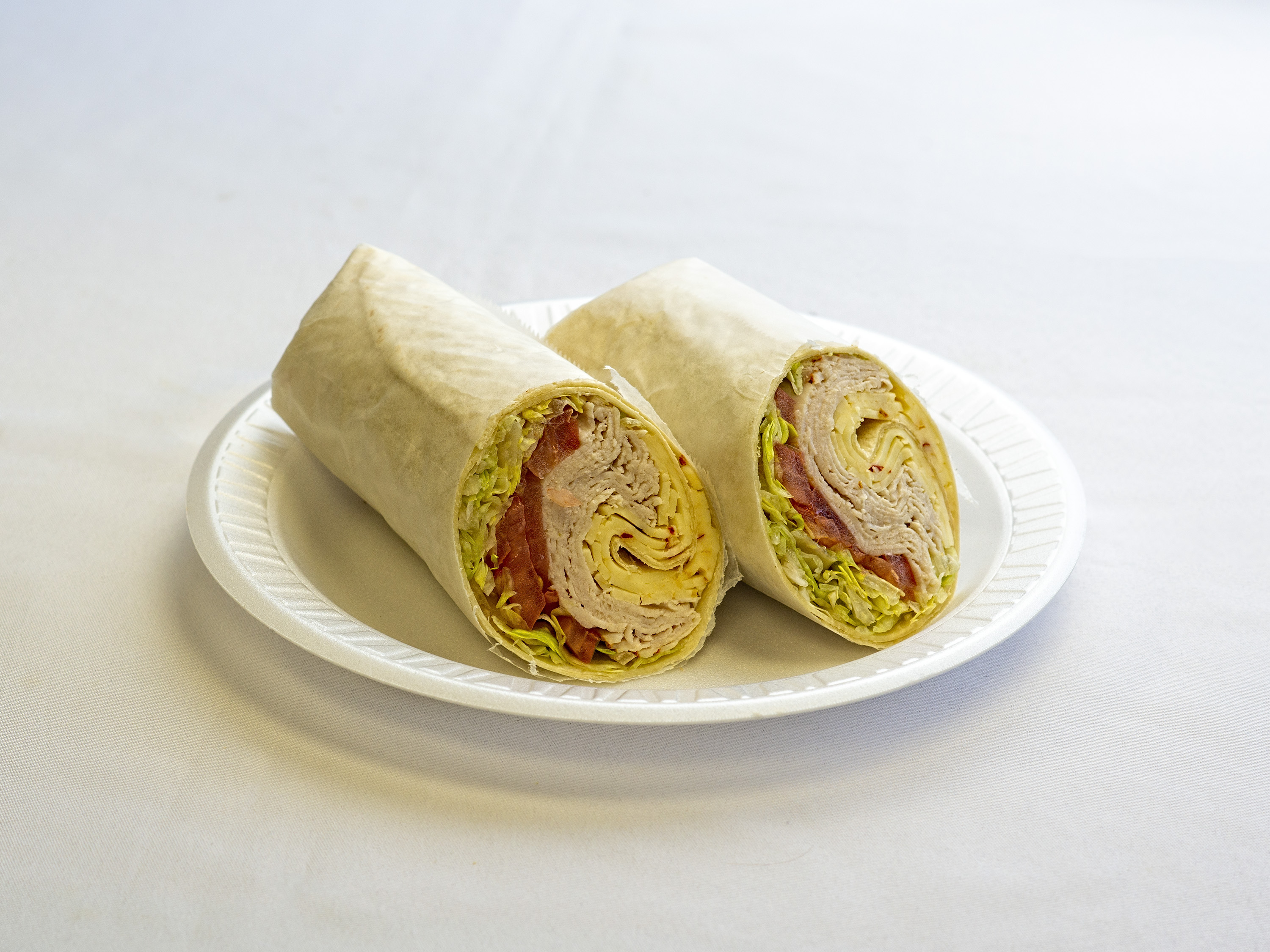 Order 5. Turkey Breast Wrap food online from Hot Bagels Abroad store, Clifton on bringmethat.com