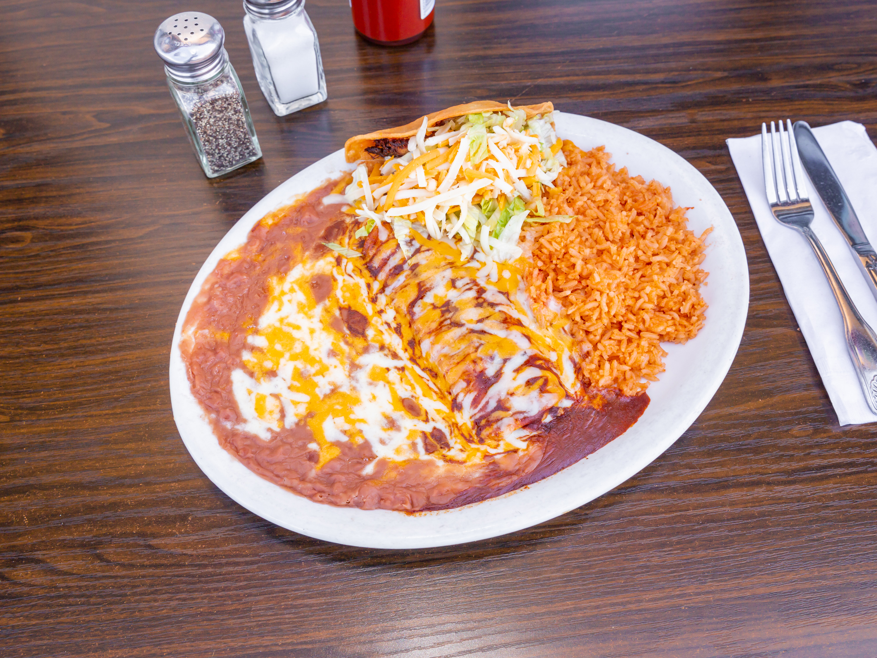 Order 6. One Chicken Enchilada and Taco Combo food online from Burnt Tortilla store, Gardena on bringmethat.com
