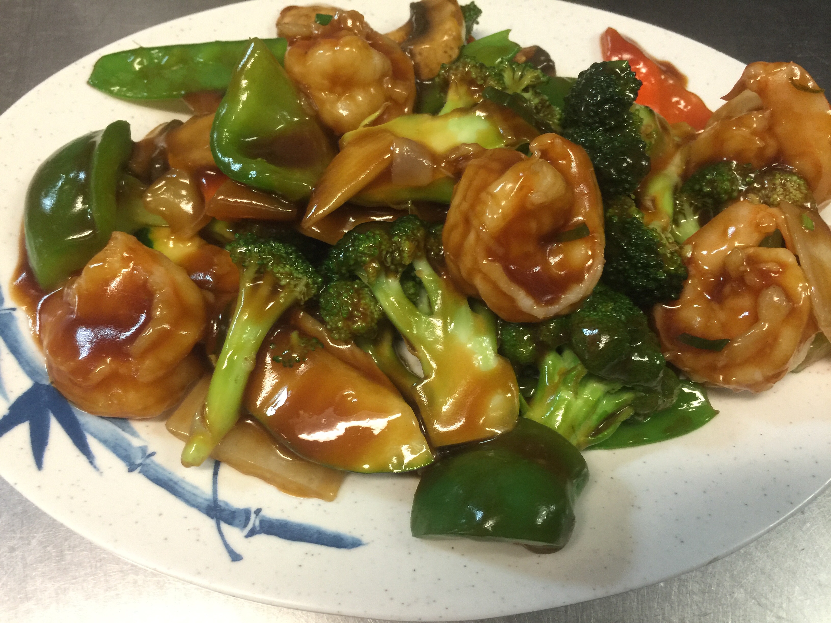 Order 65. Jumbo Shrimp with Mixed Vegetable food online from Tsing Tao Chinese Cuisine store, Mesa on bringmethat.com