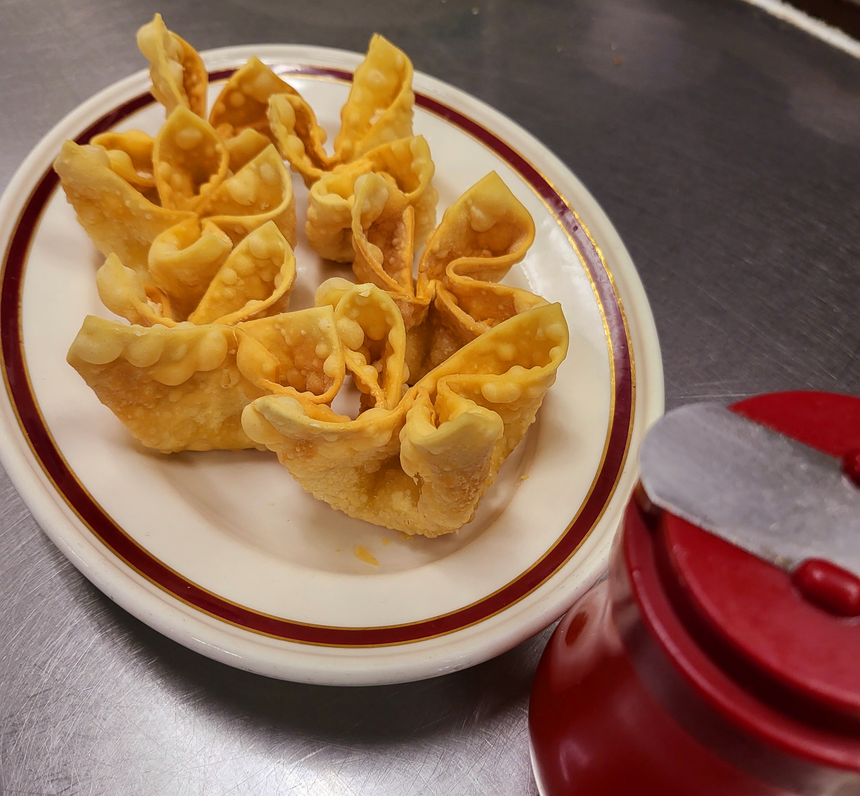 Order A07. Crab Rangoon food online from Dragon Palace Chinese Restaurant store, Davenport on bringmethat.com